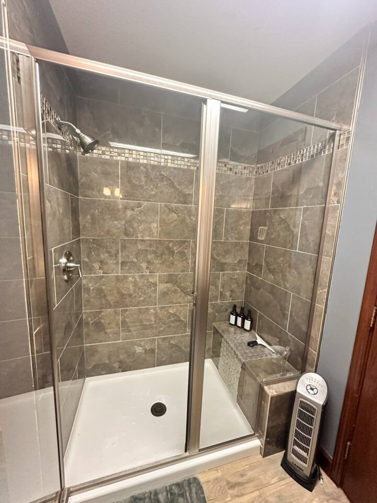 Enjoy a spa-like experience in our expansive shower. Complimentary shampoo, conditioner, and body wash included.