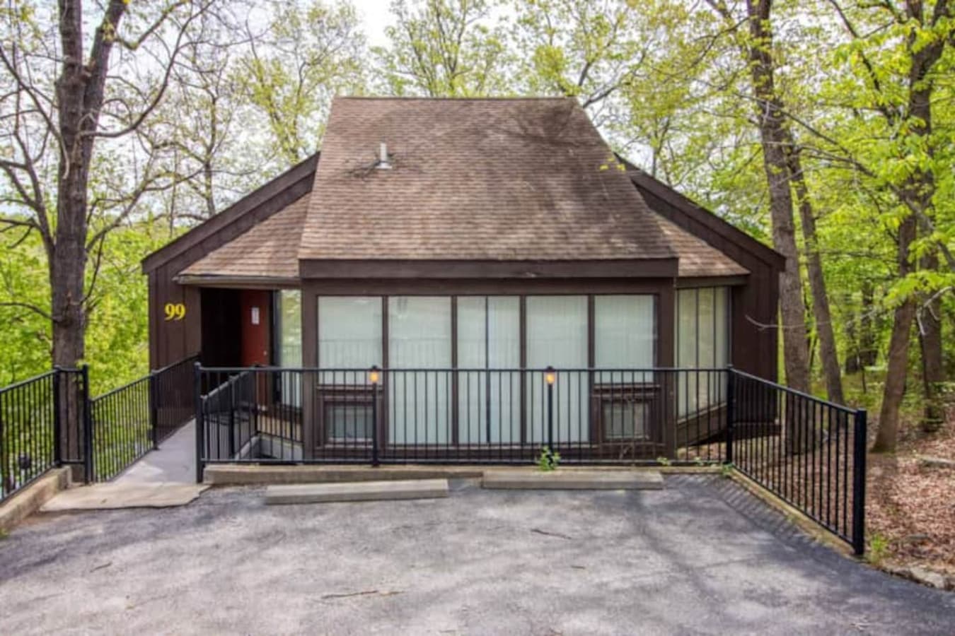 "Welcome to Treeloft Villa 99! Nestled among the trees with hints of the lake, this 3-bedroom unit offers a peaceful escape."