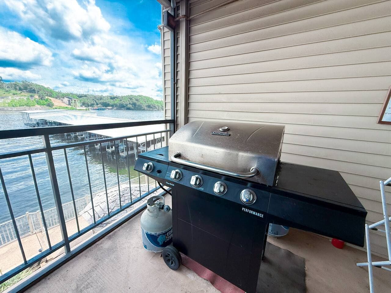 Grill with a breathtaking waterfront view from your private balcony