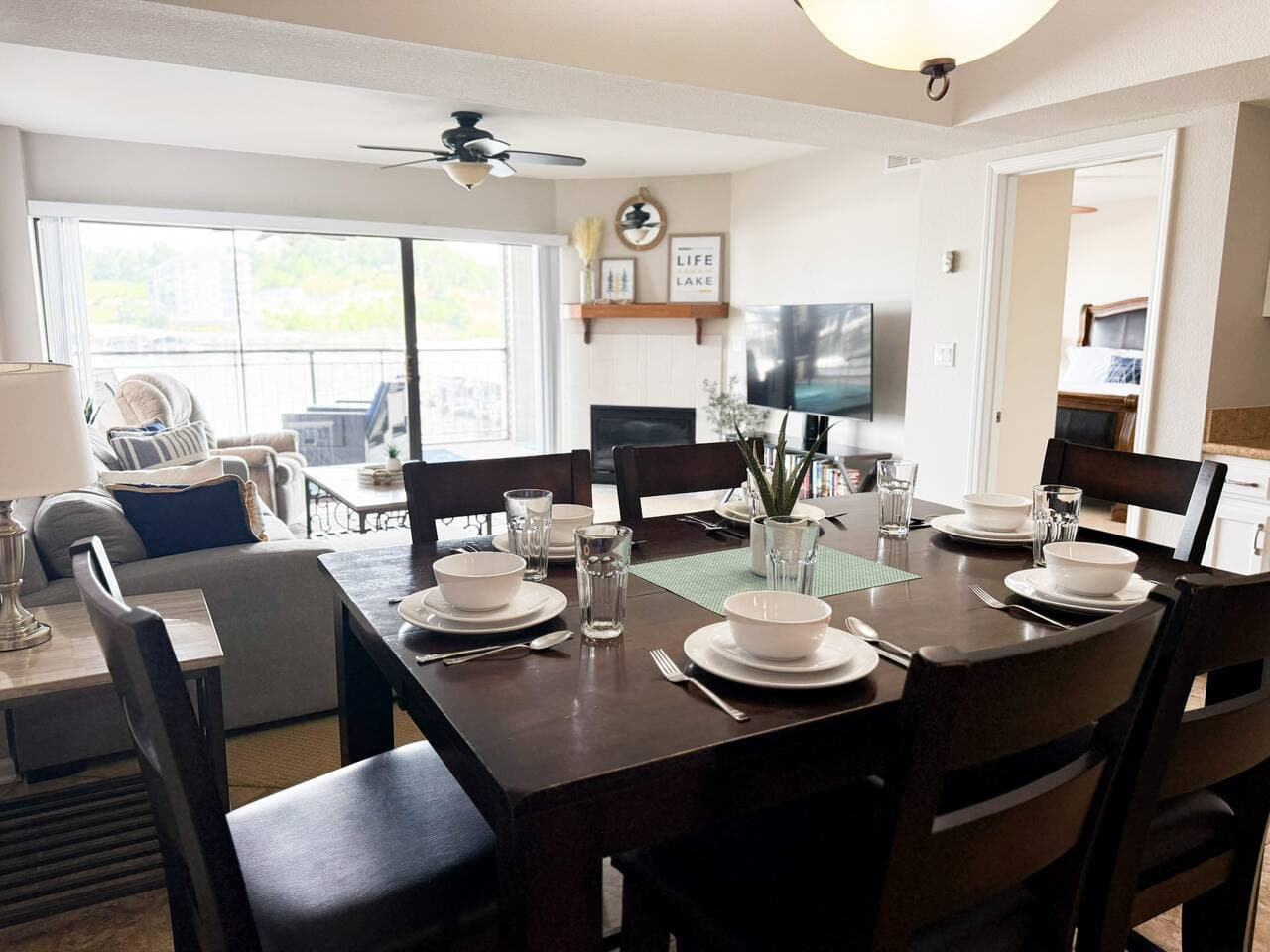 Enjoy intimate meals at our dining table, with an open view directly into the comfortable living room and beyond to the lake.