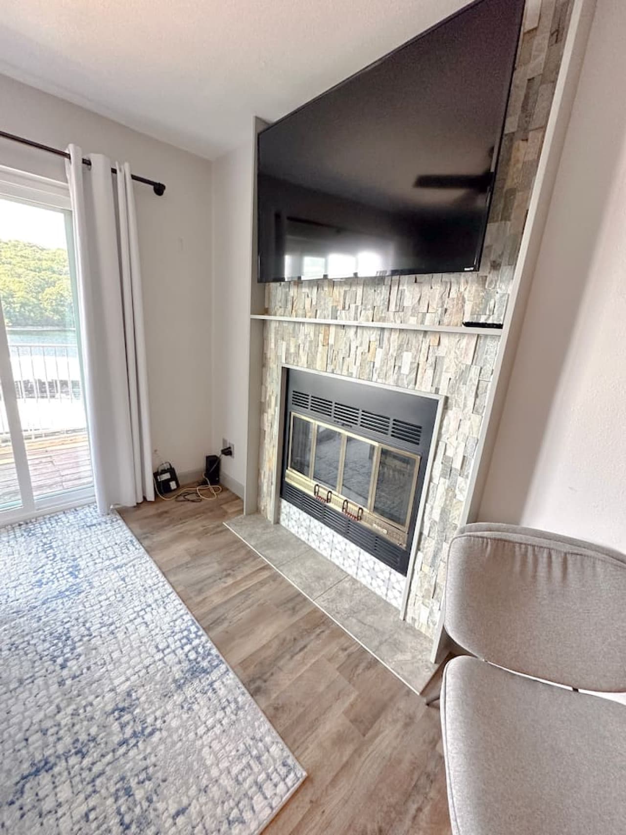Unwind upstairs with a smart TV in the second-floor living area—perfect for streaming your favorite shows and movies in a cozy, elevated space