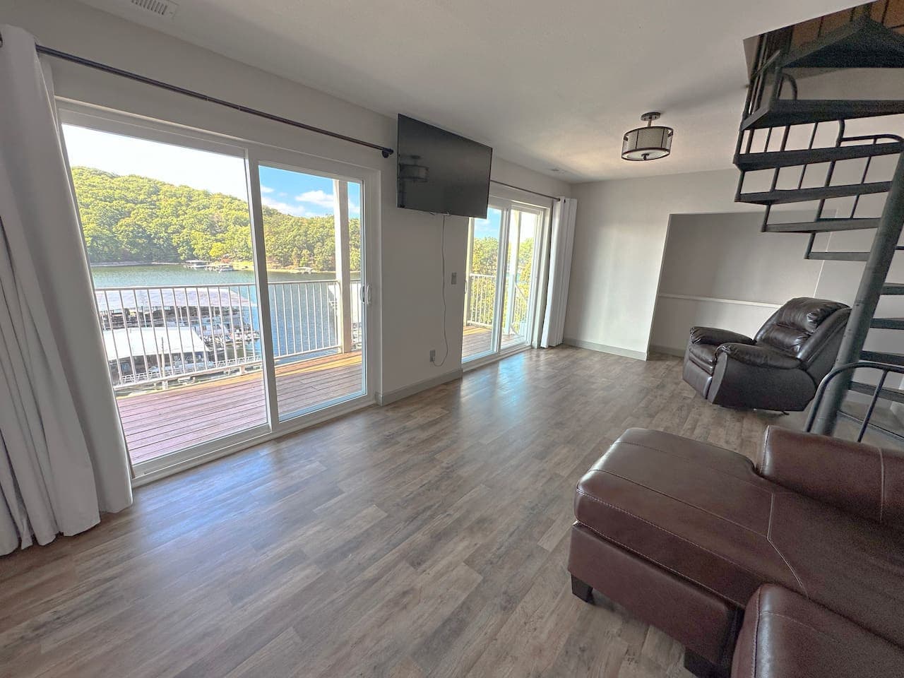 Relax in the spacious living room, perfect for unwinding or entertaining. With ample natural light and a seamless flow, this area invites you to feel right at home