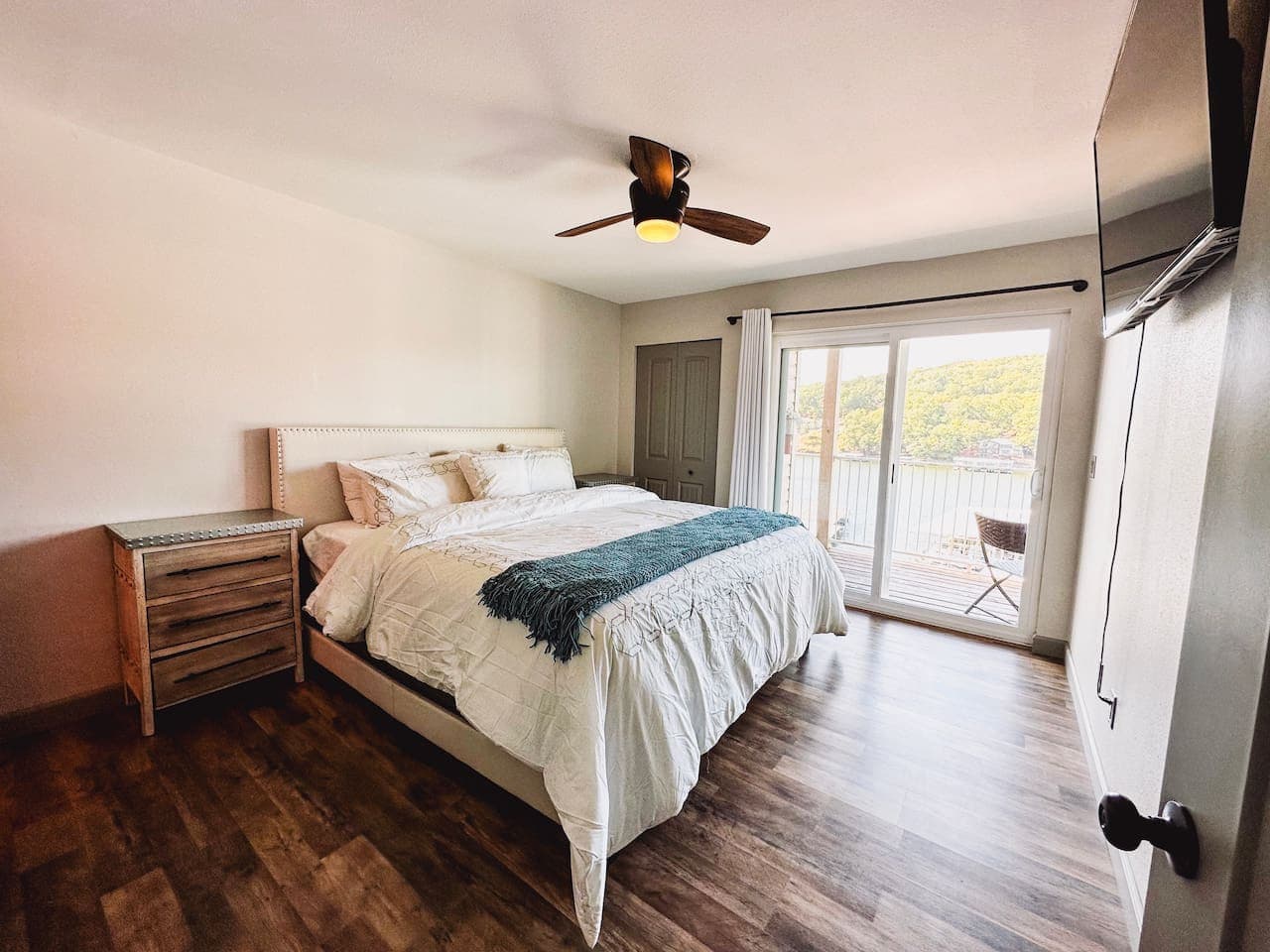 Wake up to stunning lake views in this luxurious king bedroom! Enjoy serene mornings and peaceful nights in a space designed for ultimate relaxation and comfort.