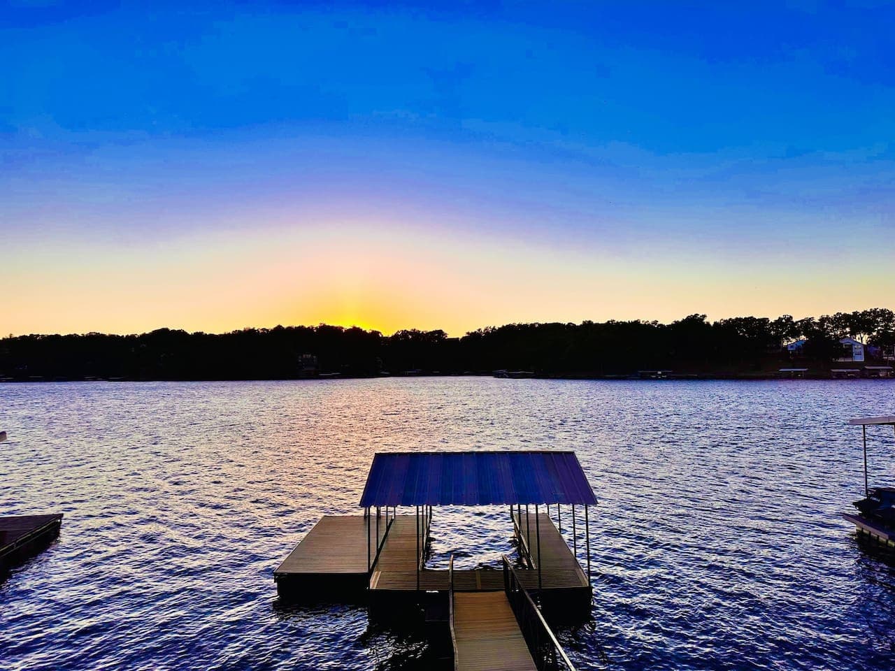 Unwind with stunning sunset views over the lake, where vibrant colors reflect off the water for a picture-perfect evening. A serene retreat awaits you!