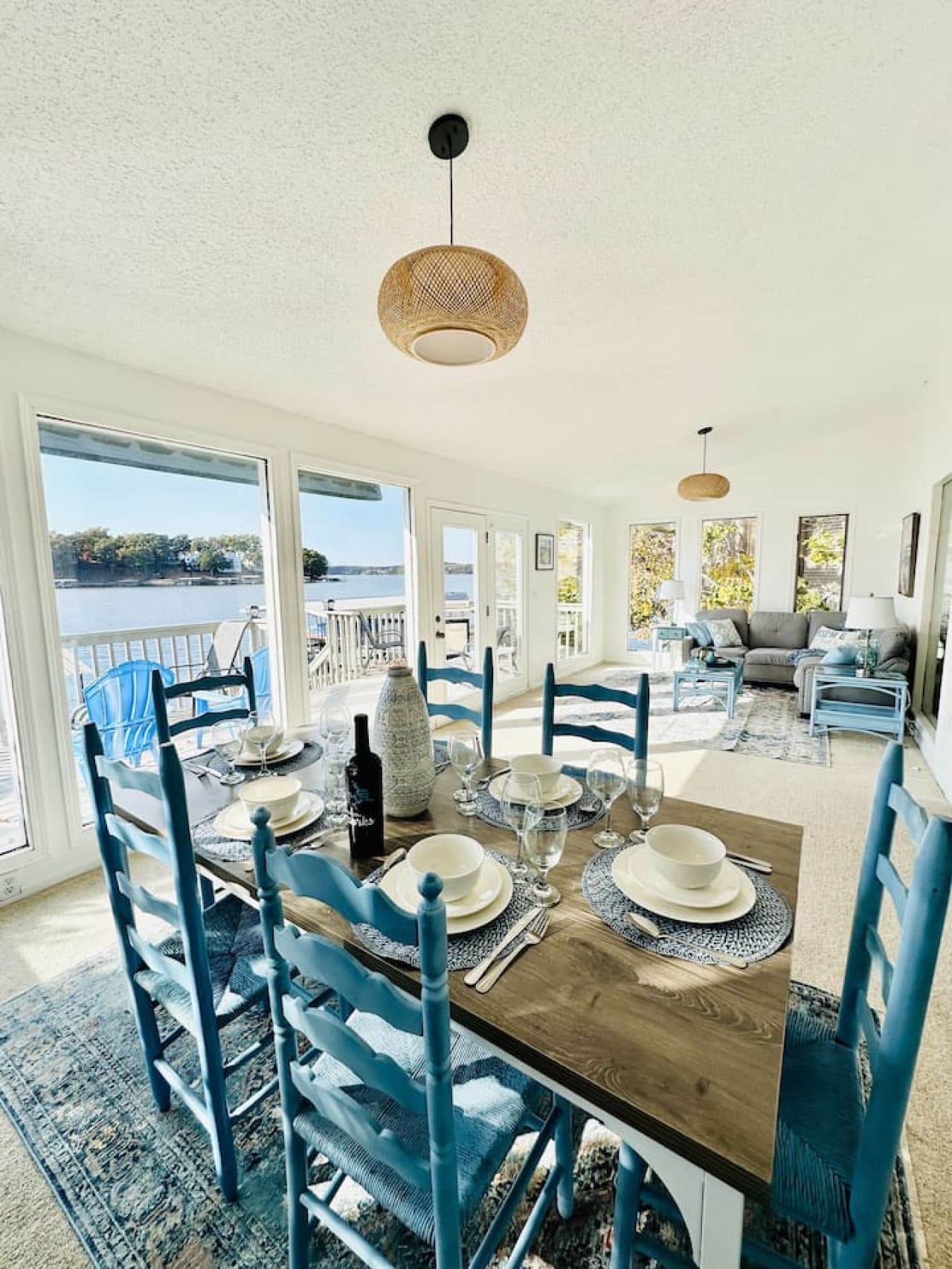 Spacious dining area with direct views of the sparkling lake.