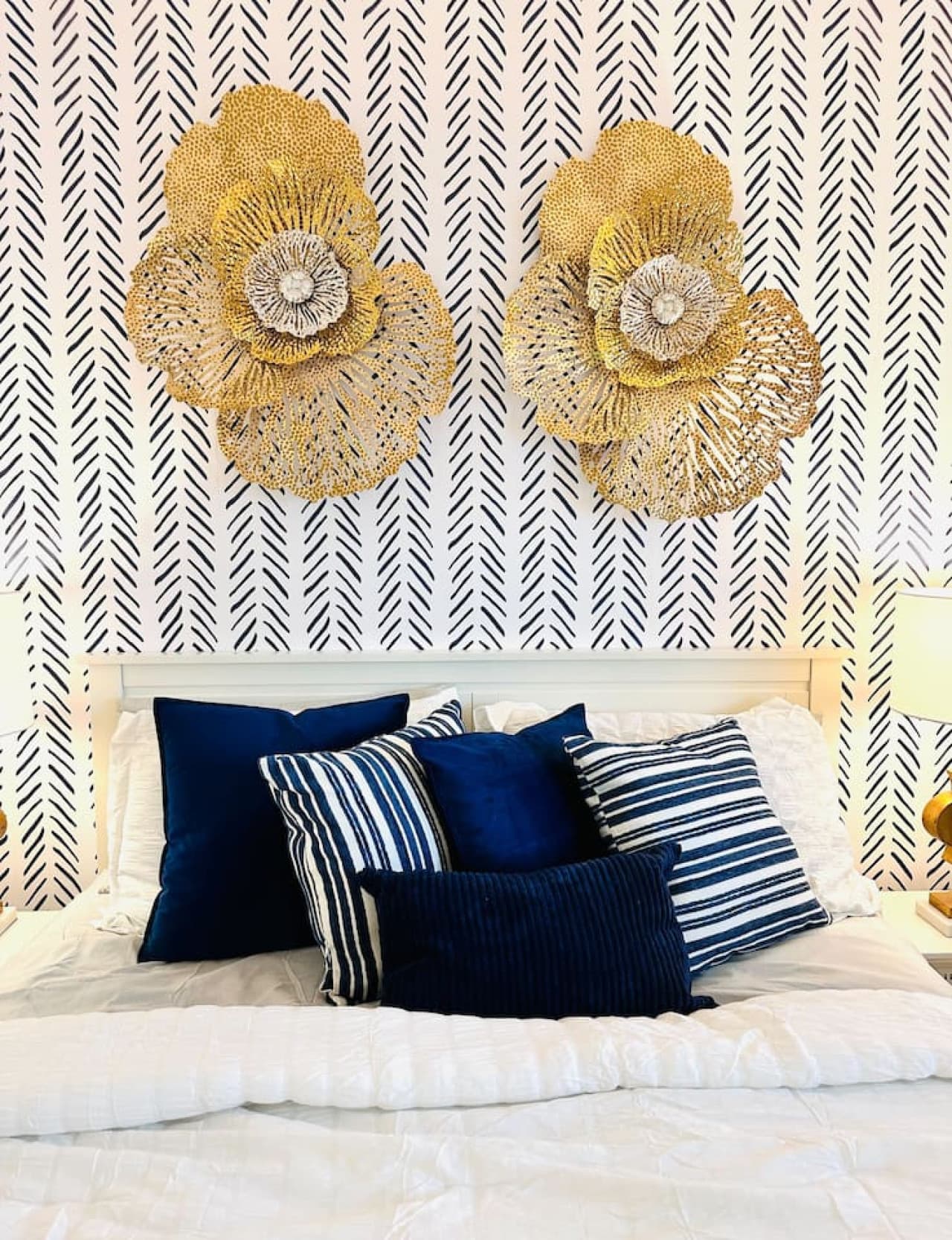 This bedroom offers plush bedding, chic decor, and a serene ambiance perfect for unwinding after a day on the lake.