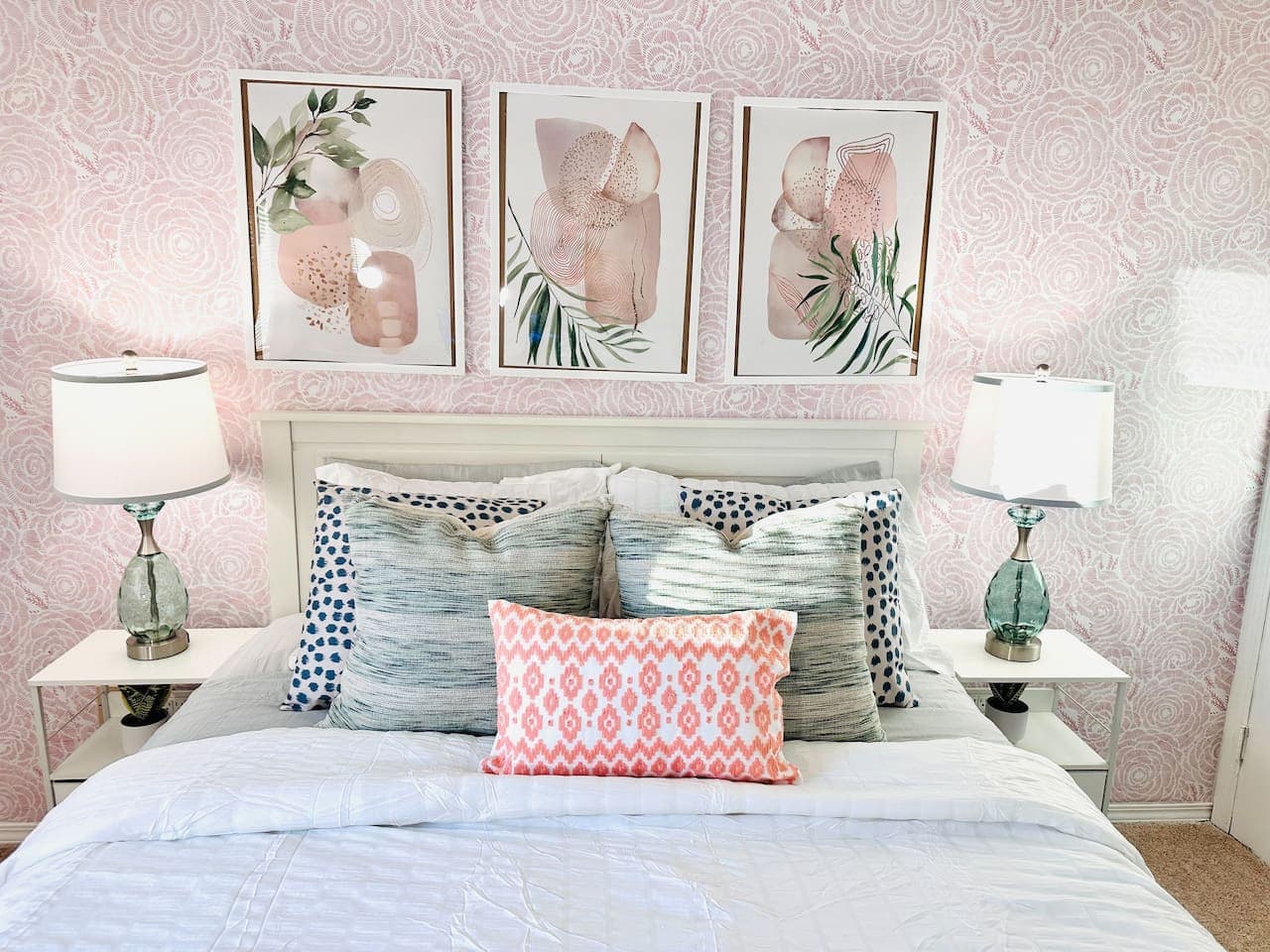 This charming bedroom at Hickory Haven offers a delightful escape with its unique decor and plush bedding.