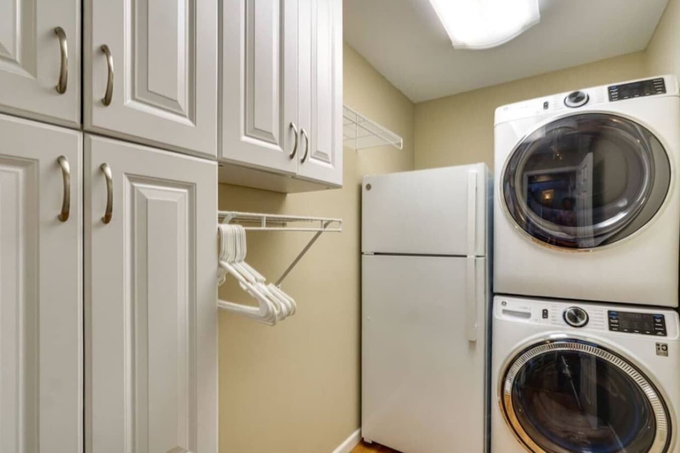 A convenient and fully equipped laundry room with modern appliances.