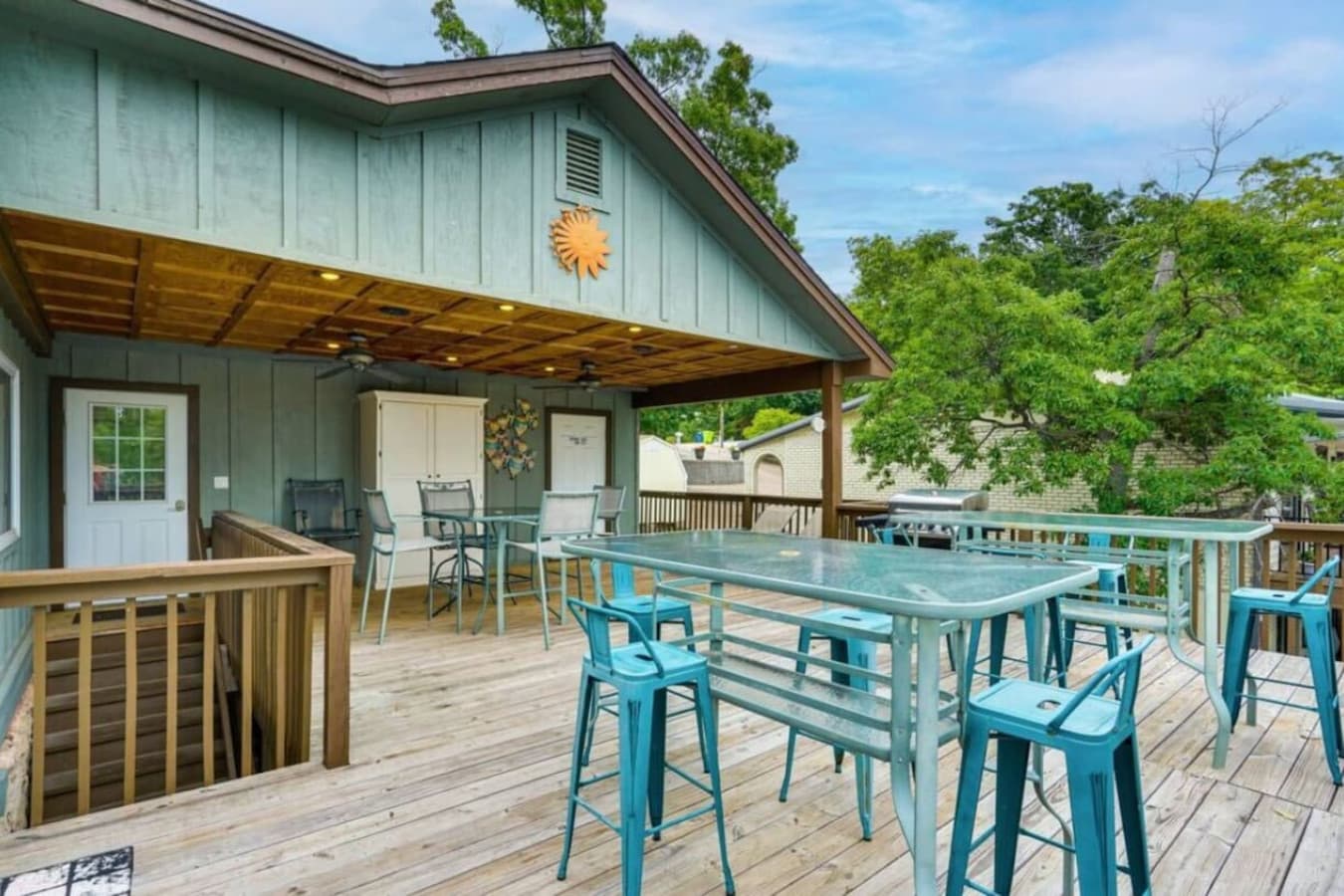 The expansive deck offers outdoor dining and relaxation with stunning views.