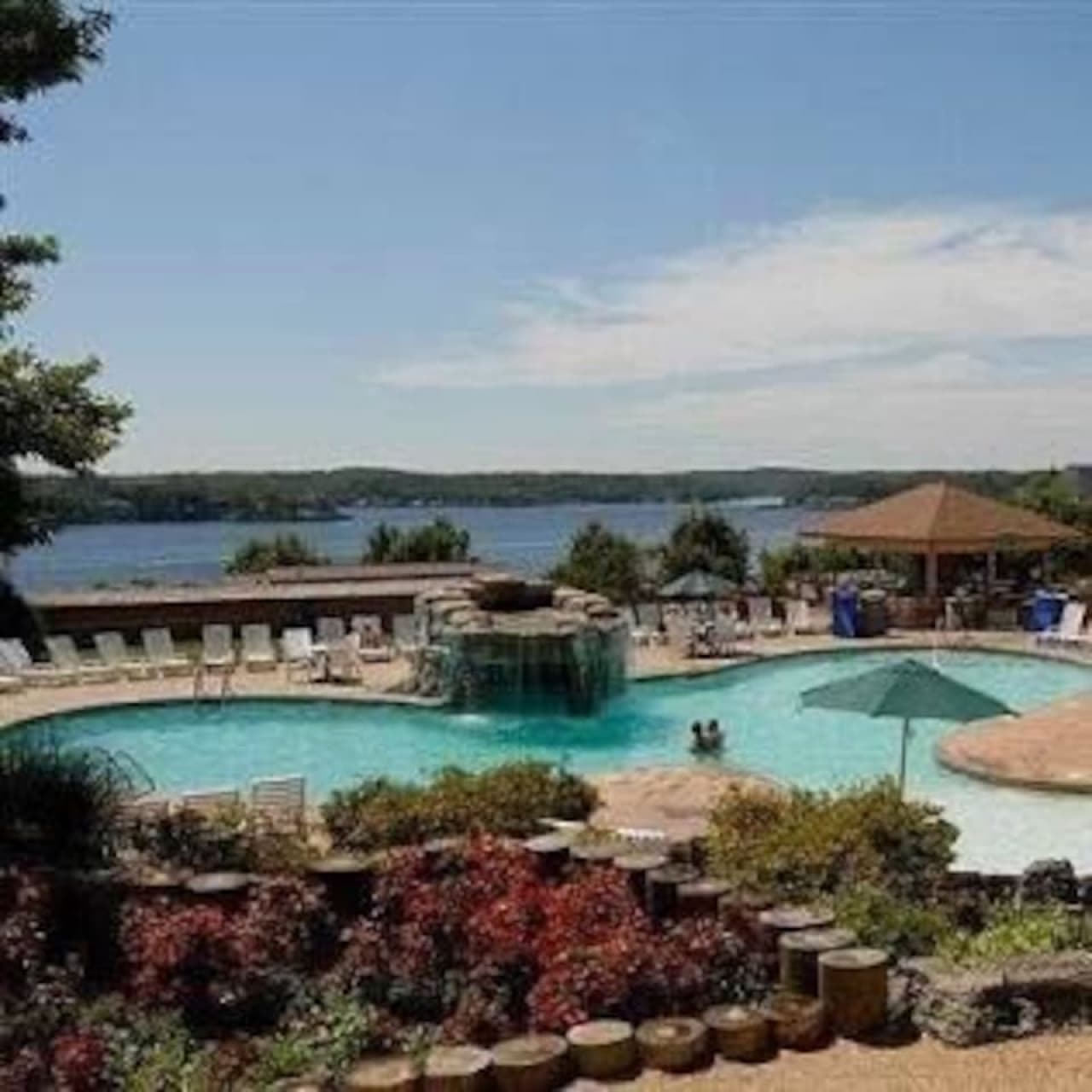 Swim with a view—this lakeside pool offers a perfect mix of tranquility and resort energy.