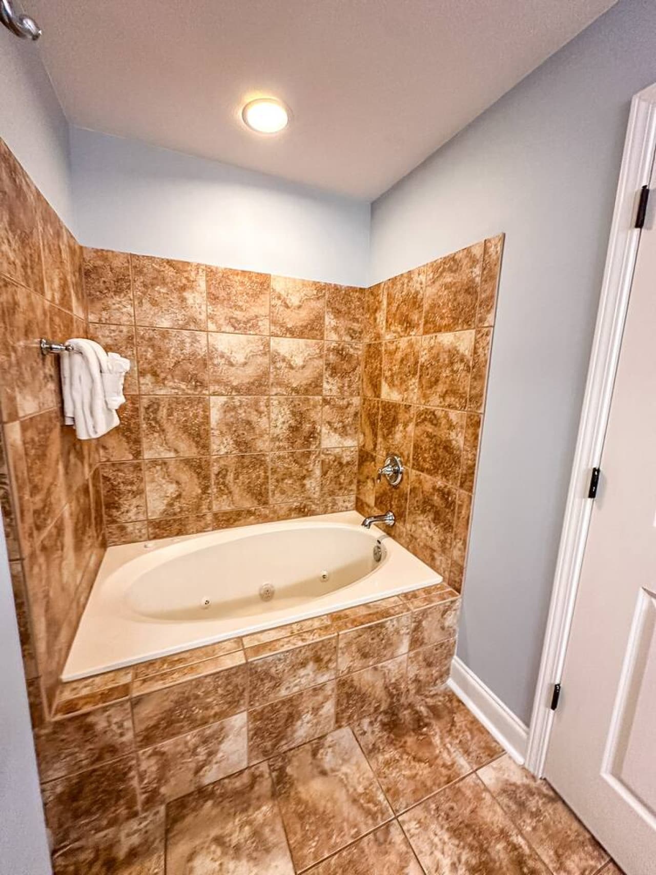 Soak and unwind in your private whirlpool tub—perfect after a day of spa treatments or lakeside fun.