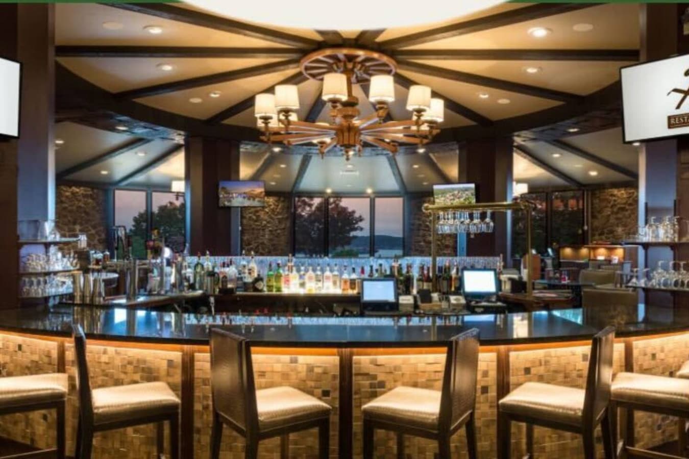 "Unwind in style at HK’s Bar & Lounge—upscale dining and drinks in an elegant lakeside setting."