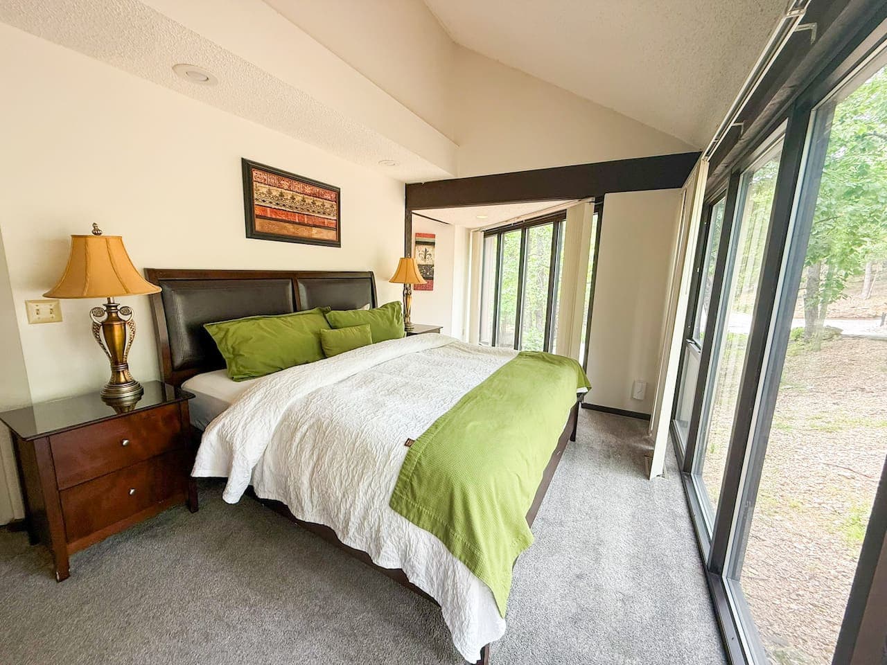 Nature sneaks right in, making every morning feel like a postcard-worthy wake-up call. Whether you're curled up in bed watching the sunrise or pretending to be productive while soaking in the scenery, this cozy retreat blends comfort with a front-row
