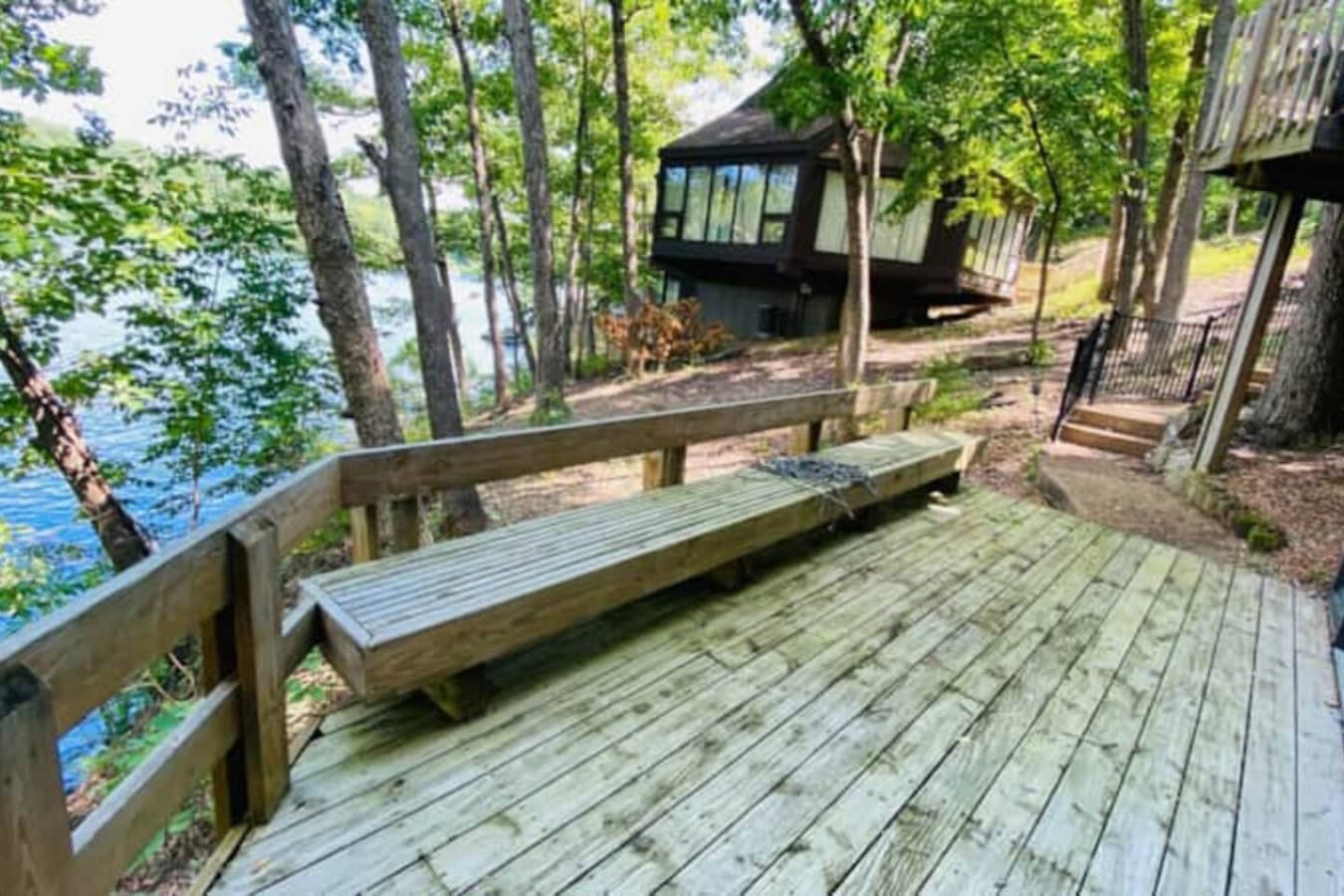 "Your private deck overlooking the water! Perfect for morning coffee or evening relaxation, surrounded by nature."