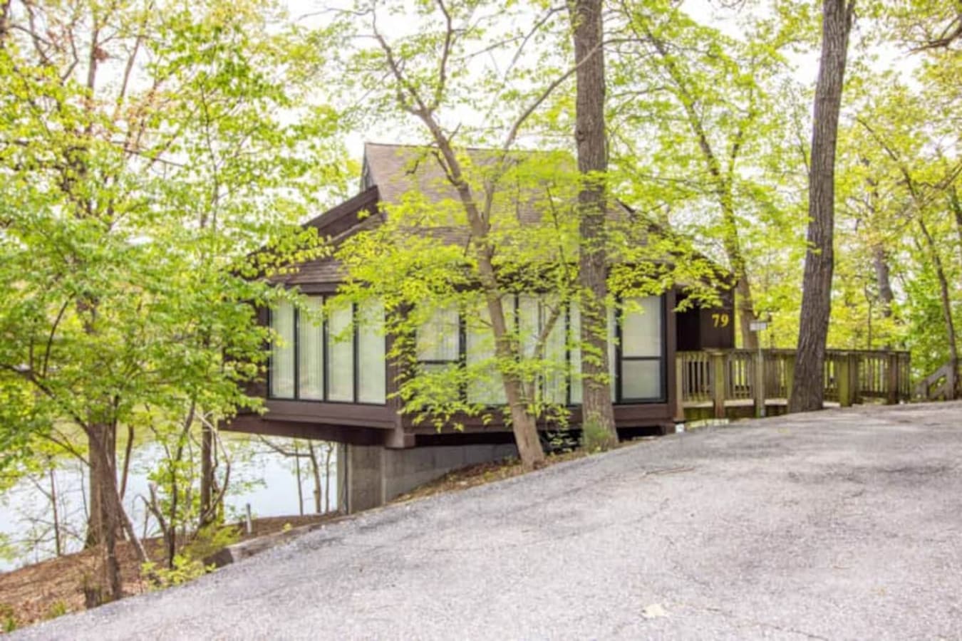 "Experience the distinct charm of Treehouse Treetop Village 79, beautifully integrated into the natural landscape for a true escape."