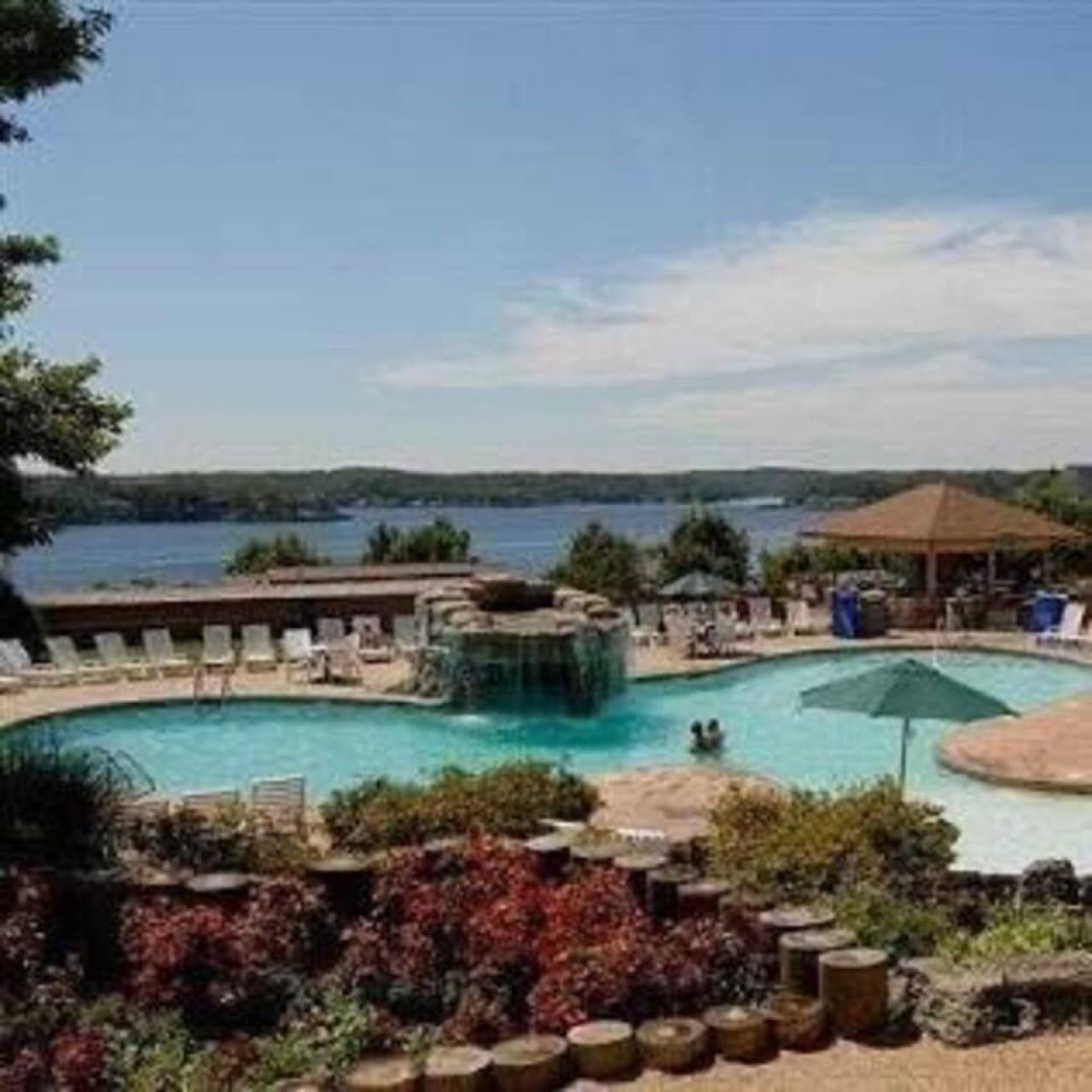 Relax poolside with breathtaking lake views and resort-style amenities.