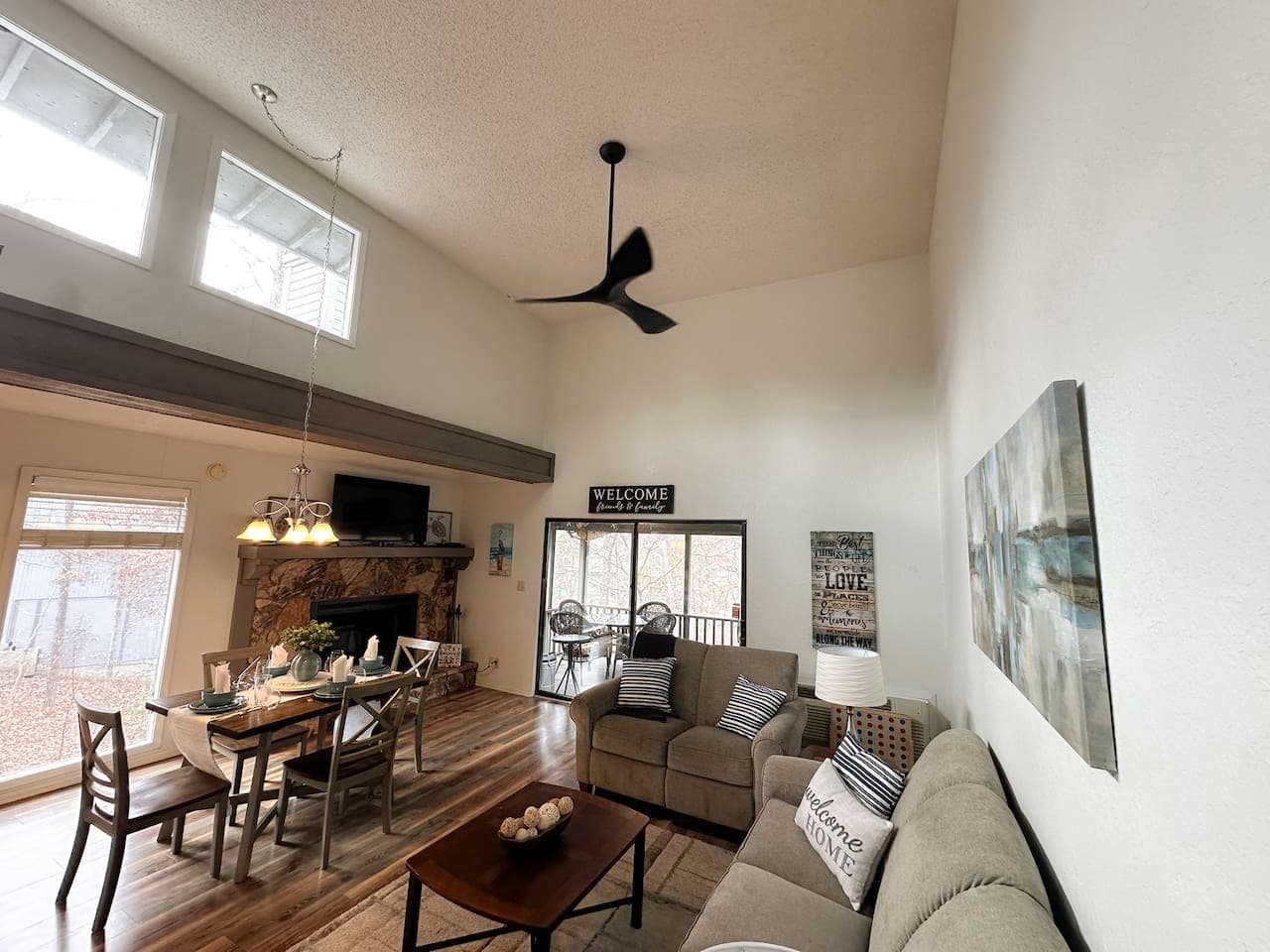 Soaring ceilings and abundant natural light create an airy and welcoming atmosphere.
