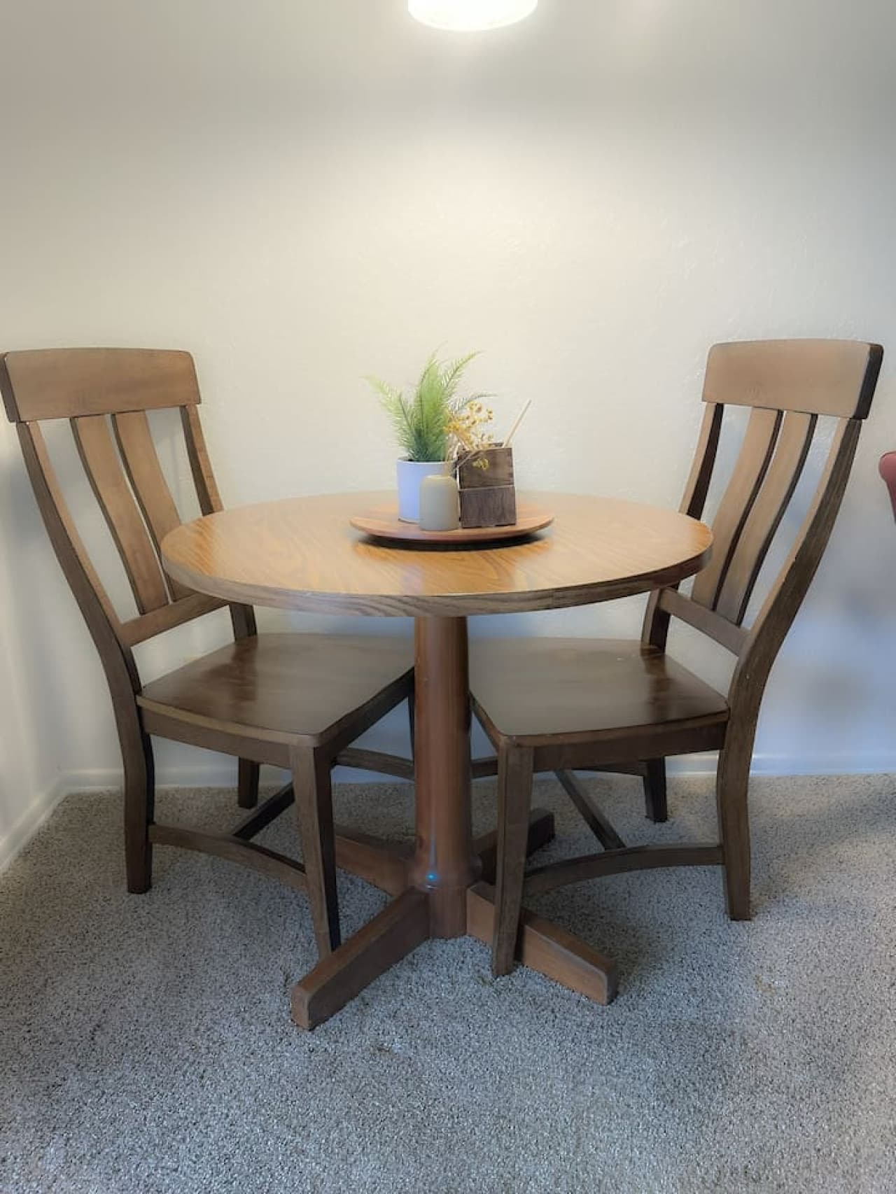 Start your day with coffee or unwind with dinner in this charming dining nook.