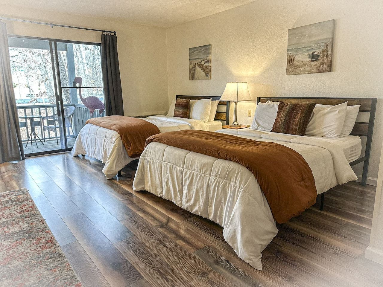 Wake up to serene forest views and enjoy the natural light flooding this comfortable queen bedroom.