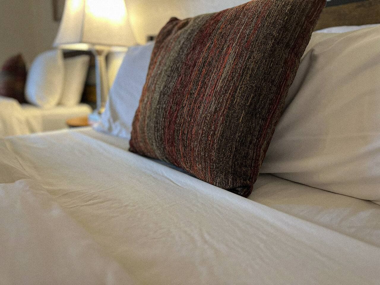Sink into soft, inviting linens – the perfect spot to recharge after a day of Margaritaville fun.