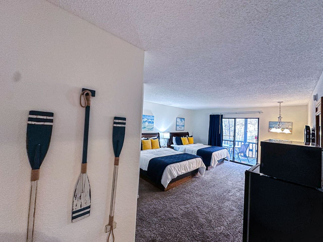 Cozy coastal vibes greet you in this beautifully decorated space.