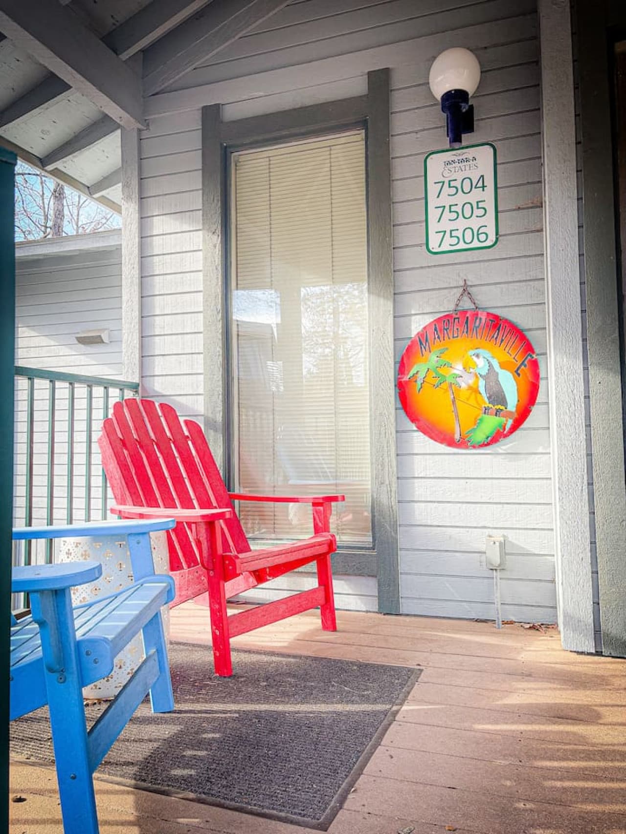 Start your morning or wind down your evening on the porch with colorful Adirondack chairs.