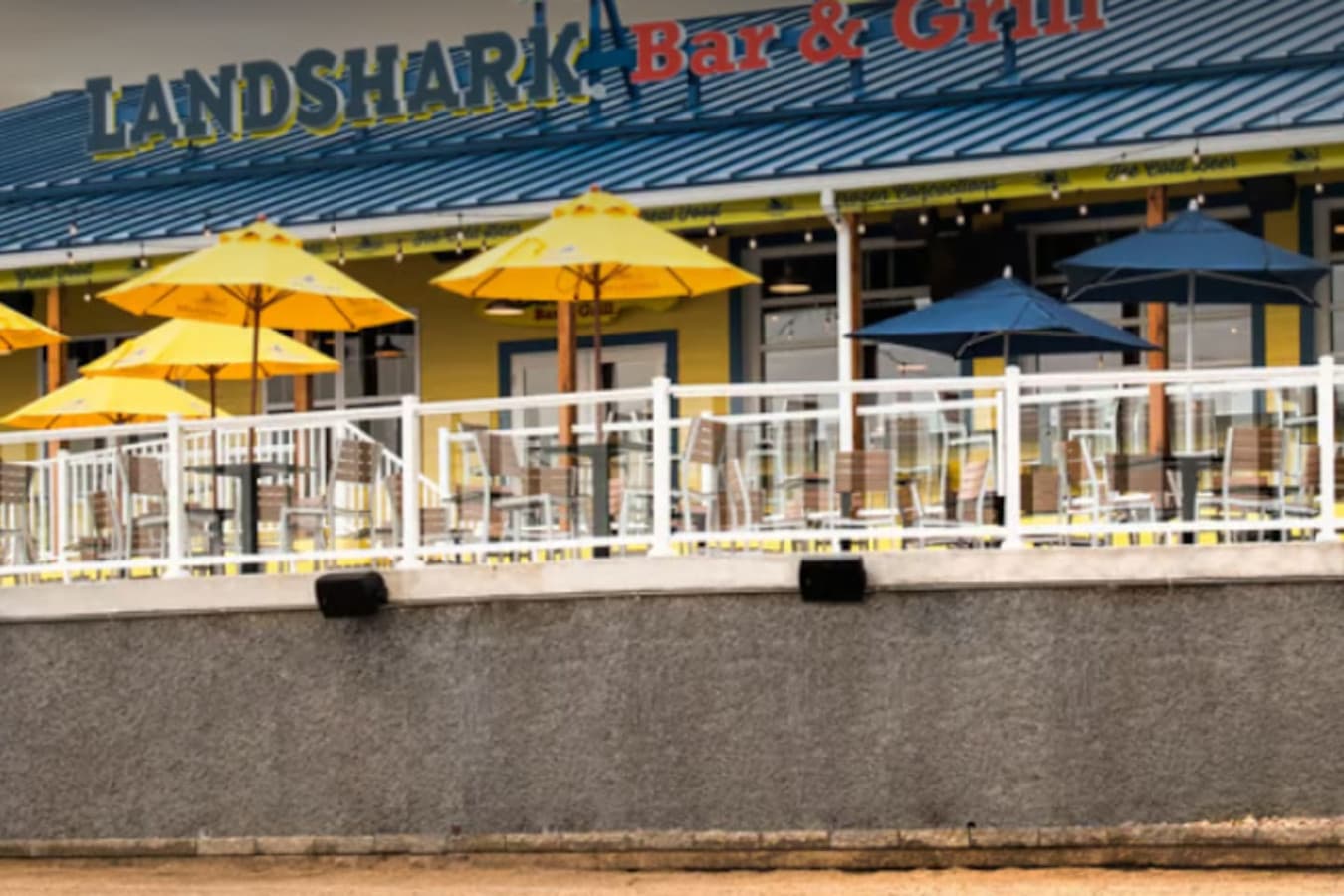 Enjoy delicious food and drinks with stunning lakefront views at the Sandshark Bar & Grill.