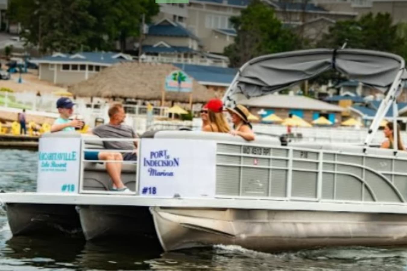 Relax and unwind on a pontoon boat, soaking up the beautiful lake views.