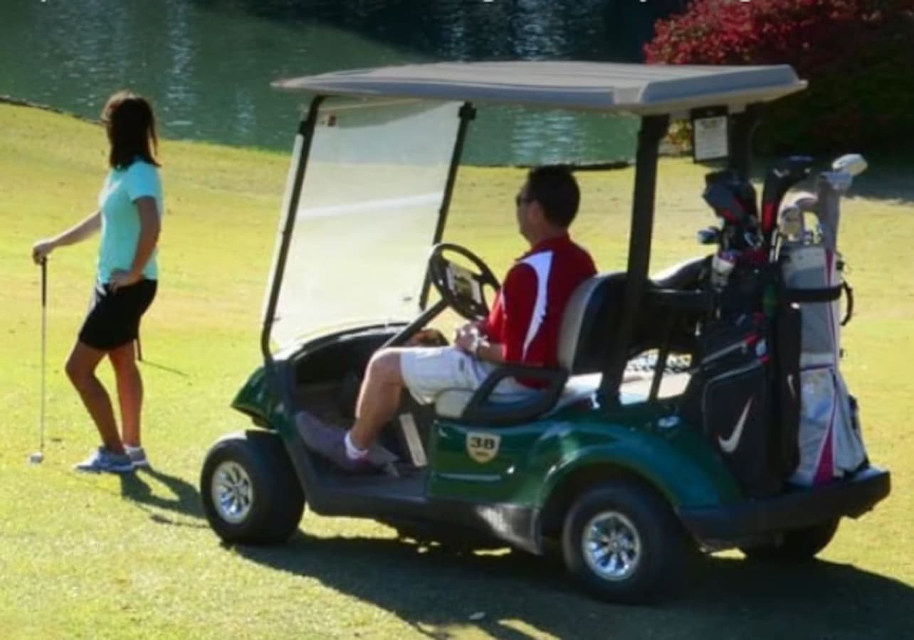 Enjoy a leisurely day on the greens with a golf cart and stunning views.