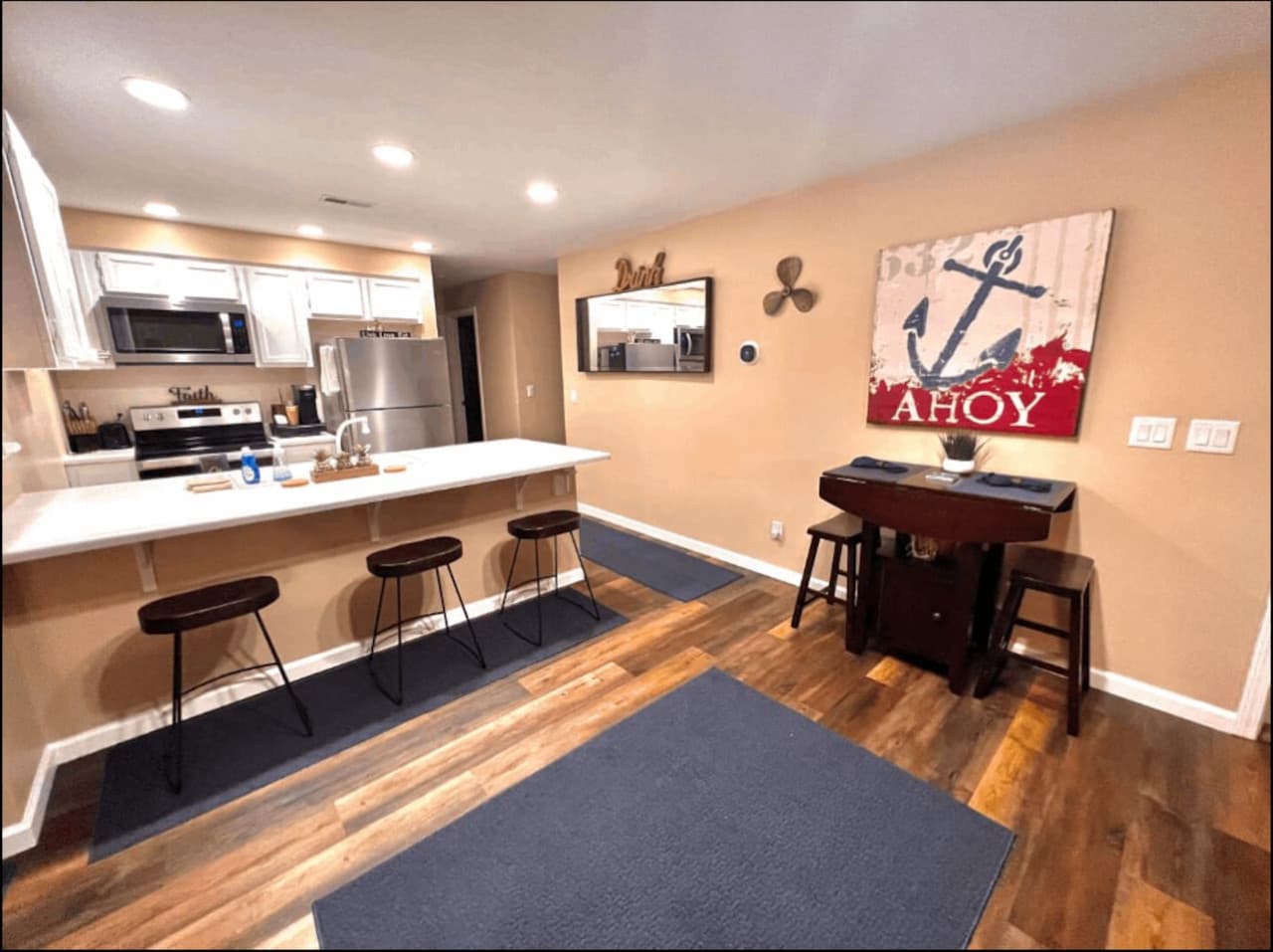 Enjoy cooking in this well-appointed kitchen with sleek appliances and generous counter space.