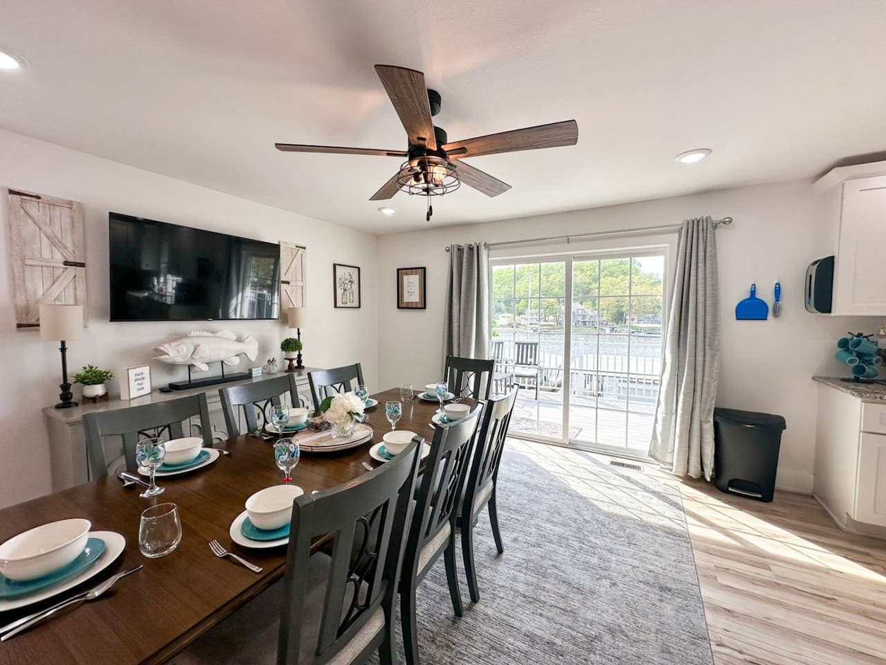 Formal dining room with seating for 8 people, smart TV for streaming and games for gamenight.