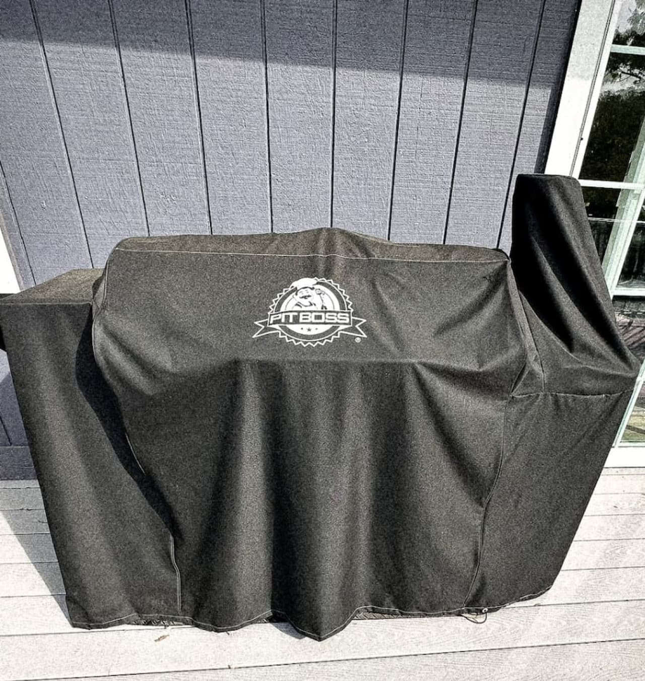 Upper level private lakefront deck offers a pellet grill.