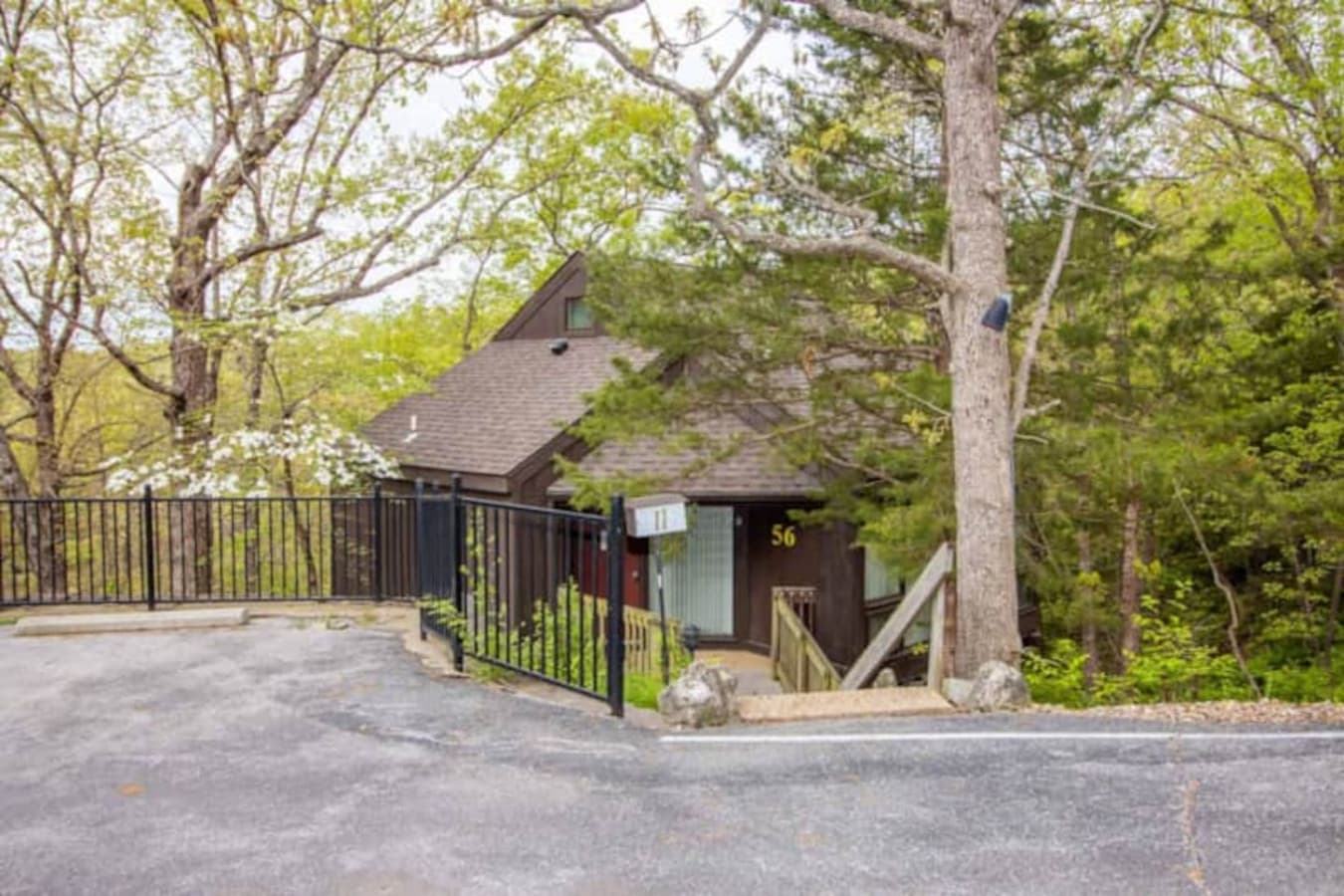 Step into your treehouse-style getaway—Unit 55 combines rustic charm with lakeside convenience.
