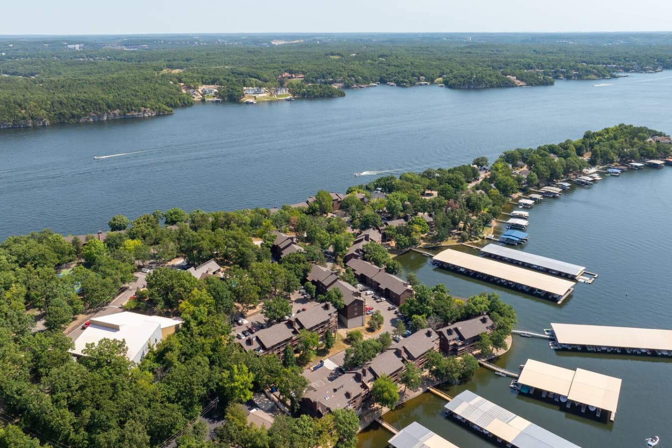 Welcome to The Knolls! See the extensive docks and prime lake access that await your stay at Knoll Worries, our luxury 2-bedroom condo. Enjoy seamless boating, fishing, and all the incredible community amenities this exclusive Lake of the Ozarks reso