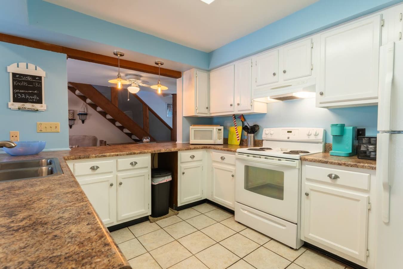 "Whip up delicious meals in your fully equipped kitchen! Everything you need for convenient cooking during your Lake of the Ozarks adventure."