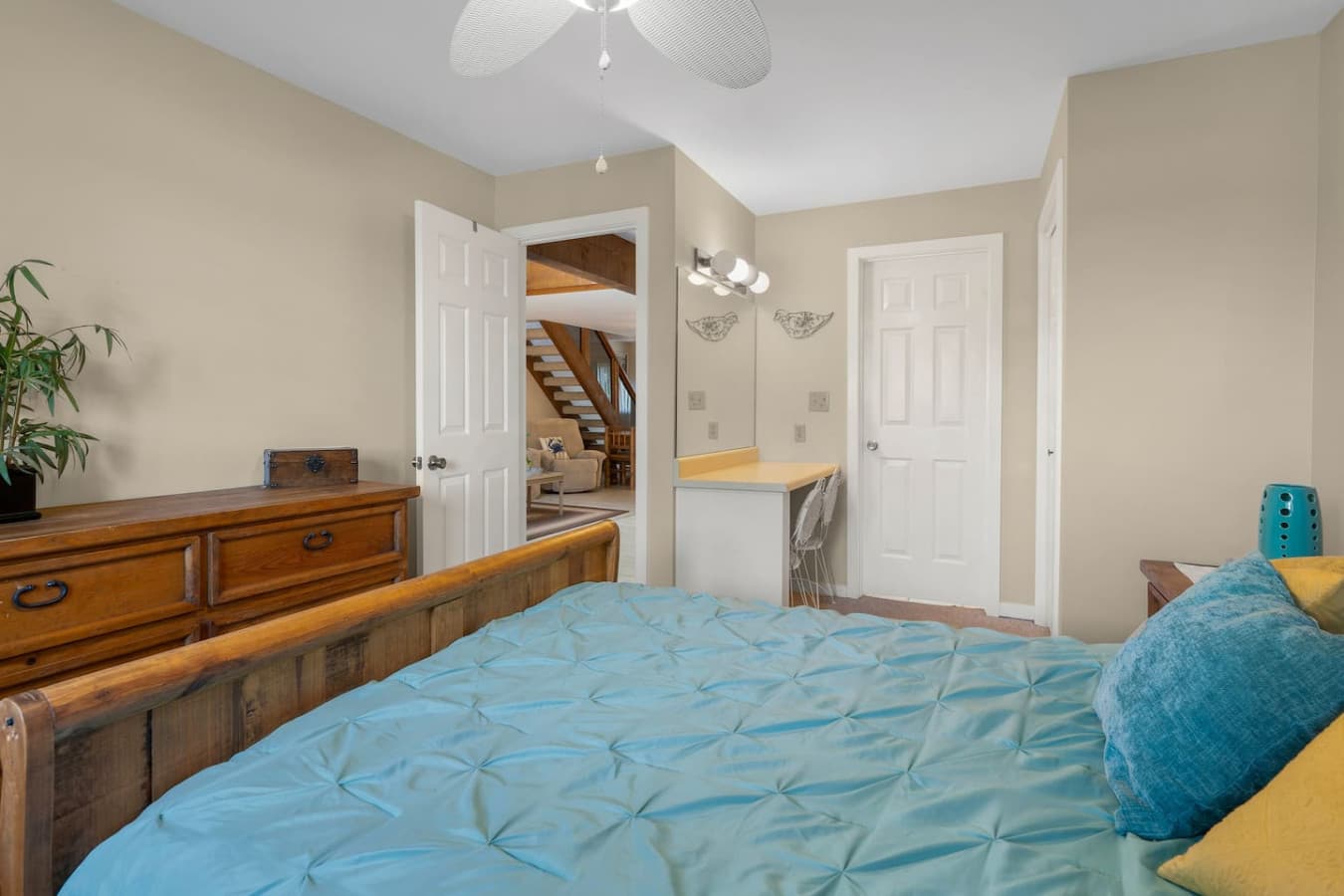 "Comfort and charm await in this inviting bedroom. Thoughtfully decorated to ensure a peaceful night's sleep for every guest."