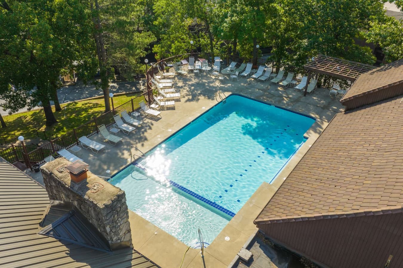 "Soak up the sun and enjoy a refreshing dip in one of the inviting pools at The Knolls Resort – your perfect oasis awaits!"