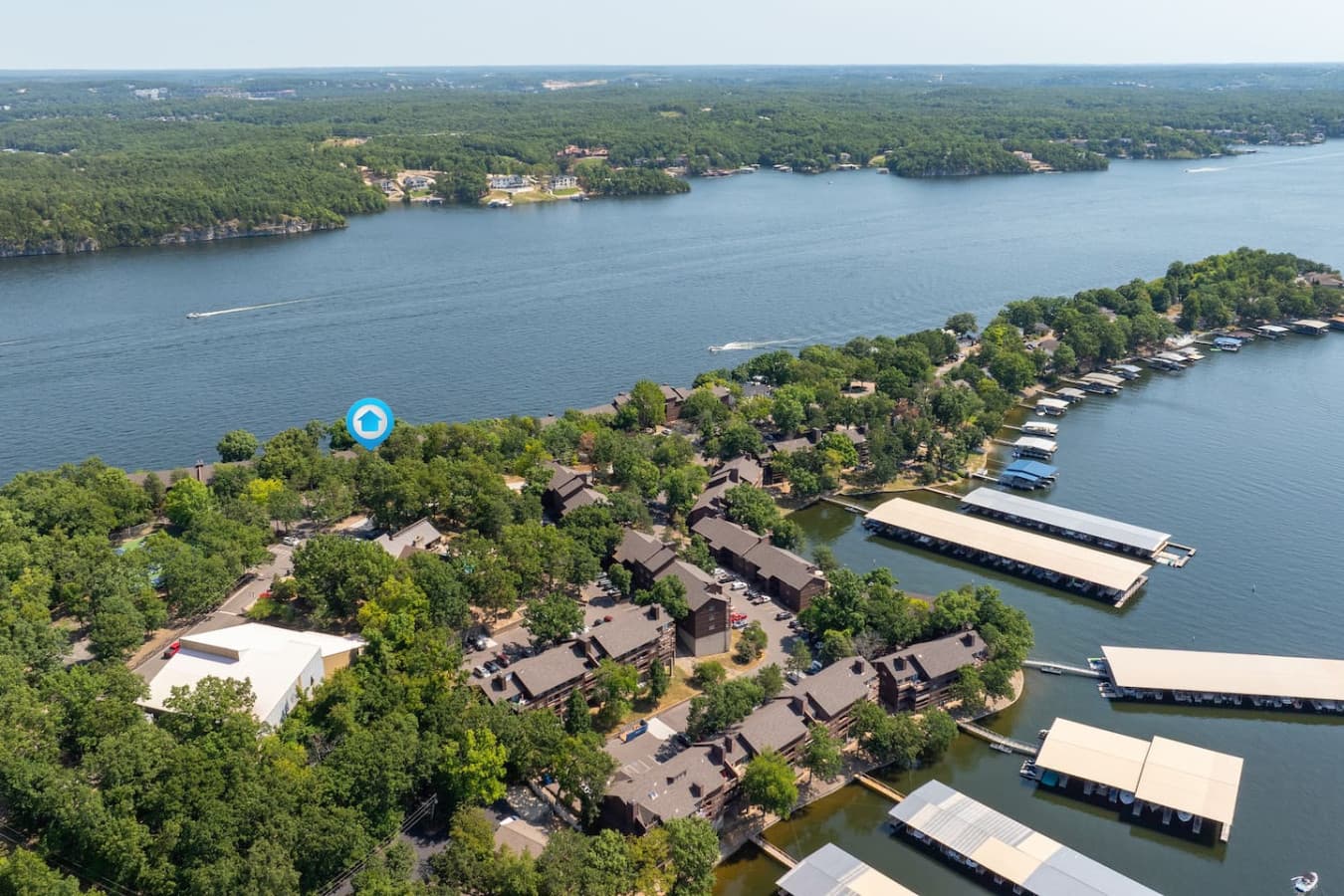 This aerial view highlights your incredible access to the Lake of the Ozarks. At Knoll Worries, you're steps away from boating, fishing, and endless water adventures.