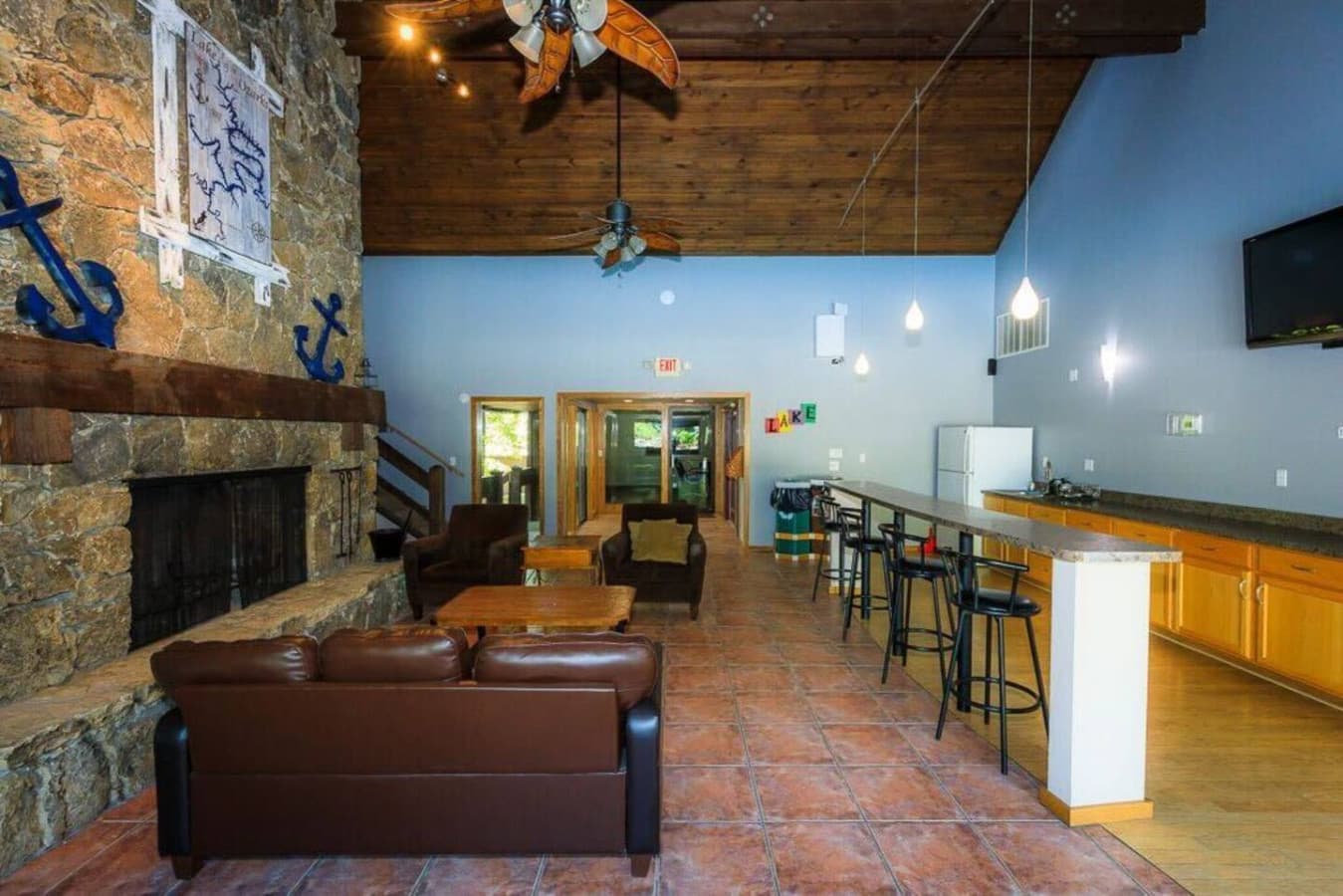 Perfect for socializing, this area features a bar, seating, and a cozy atmosphere.