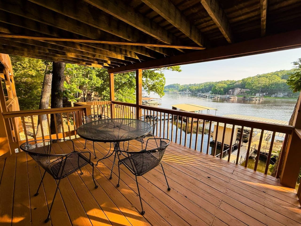 Start your day with sunshine and serenity at Patriotic Shores, where lake life begins on the deck.