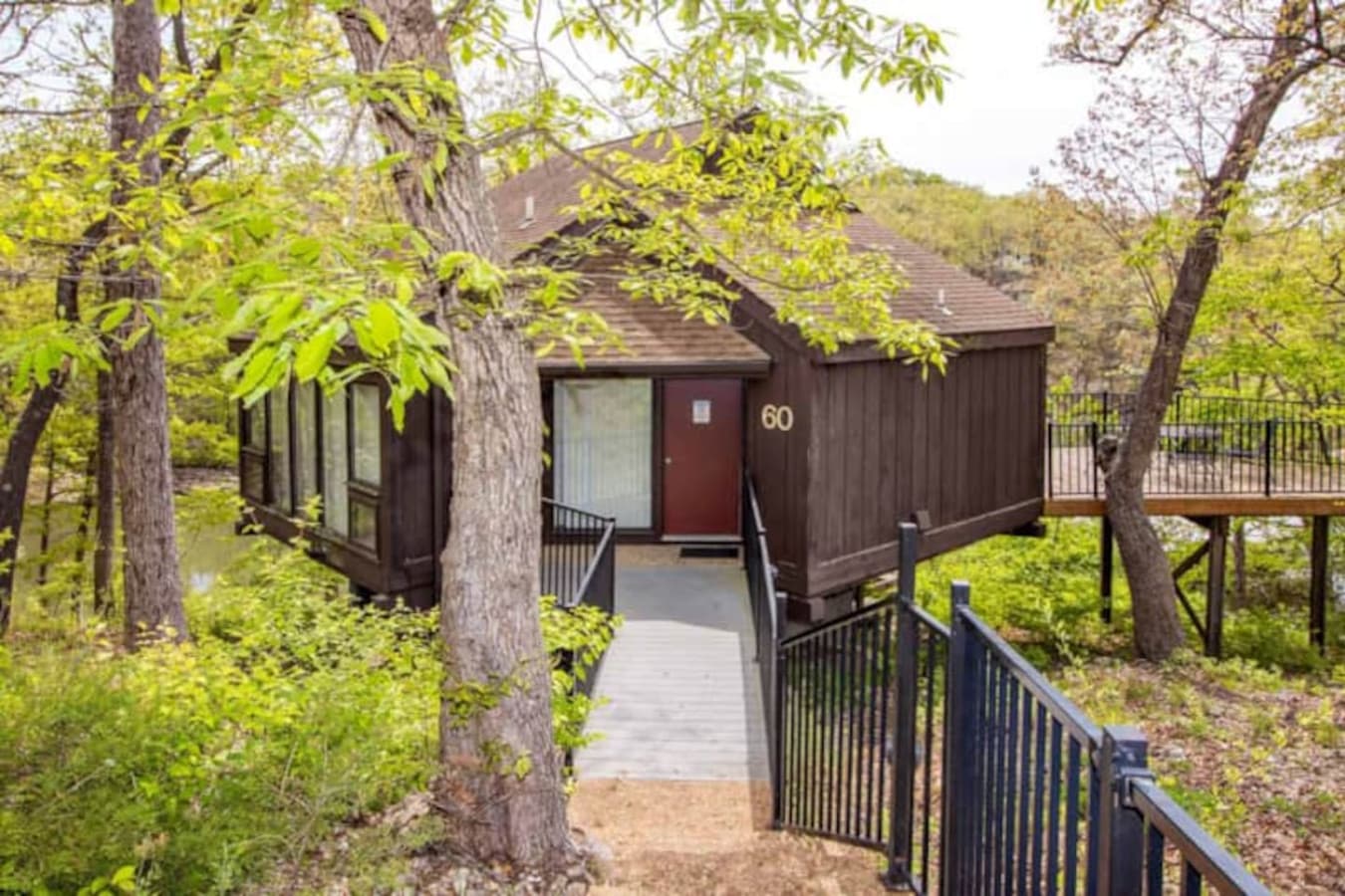 Welcome to Treetop Villa 60! Your charming lakeside retreat nestled in the heart of the Treetop Village Ozarks."