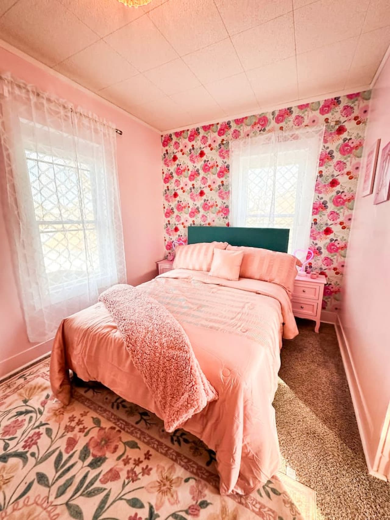 Sleep in style in this bright pink-themed  bedroom with plush bedding, natural light, and charming decor—perfect for romantic stays, girls’ trips, and weekend getaways near top attractions.