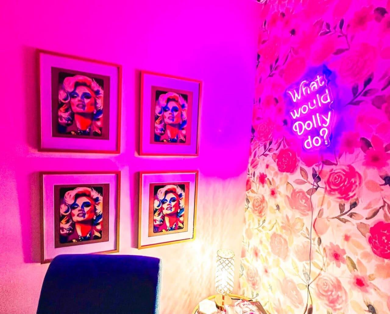 Stay in this bold, Dolly-inspired Airbnb with glowing neon accents and artistic flair, perfect for celebration trips, photo-worthy stays, and weekend escapes near everything.