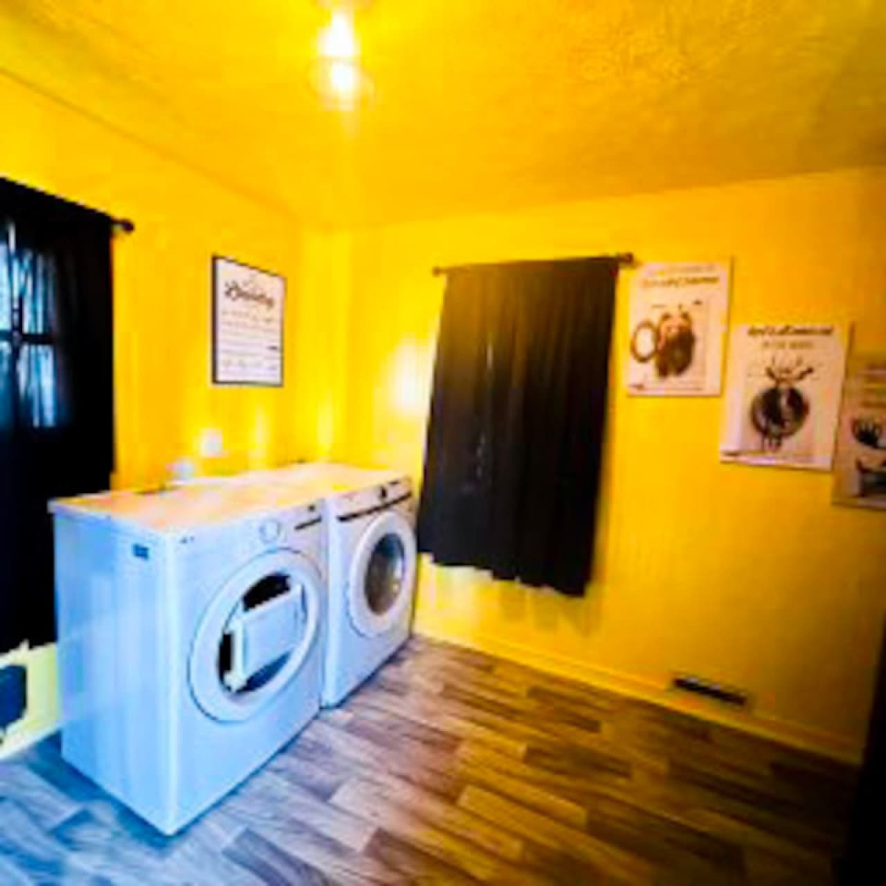 Enjoy the convenience of this in-unit Airbnb laundry space with full-size washer and dryer, perfect for extended stays, families, and long weekend getaways near top attractions.