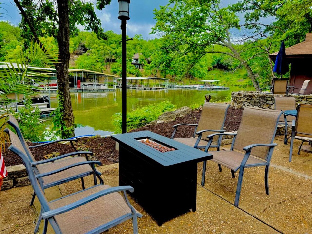 End your day with lakeside warmth and good company—fire pit views included!