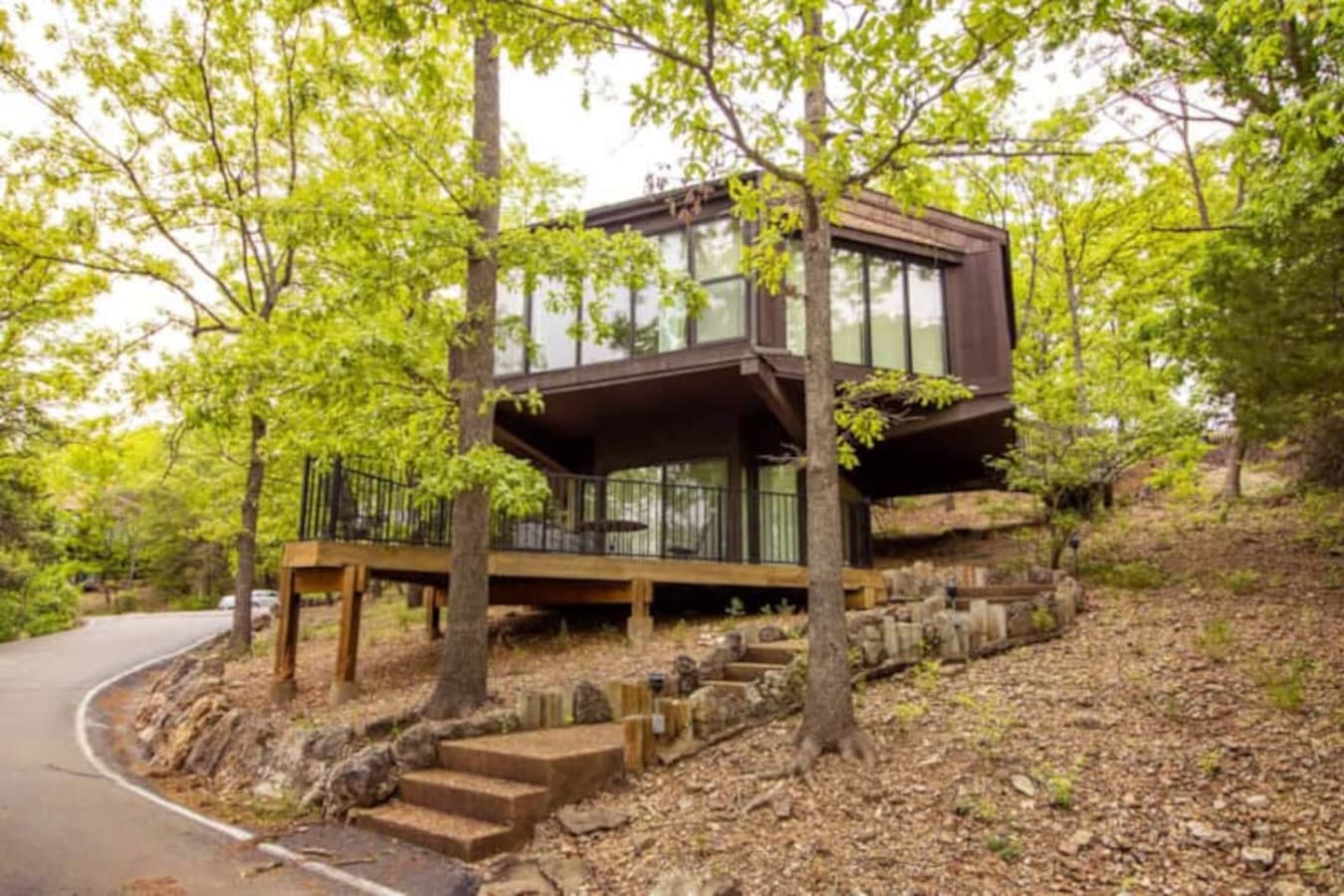 Step into your treehouse-style getaway—Unit 54 combines rustic charm with lakeside convenience.