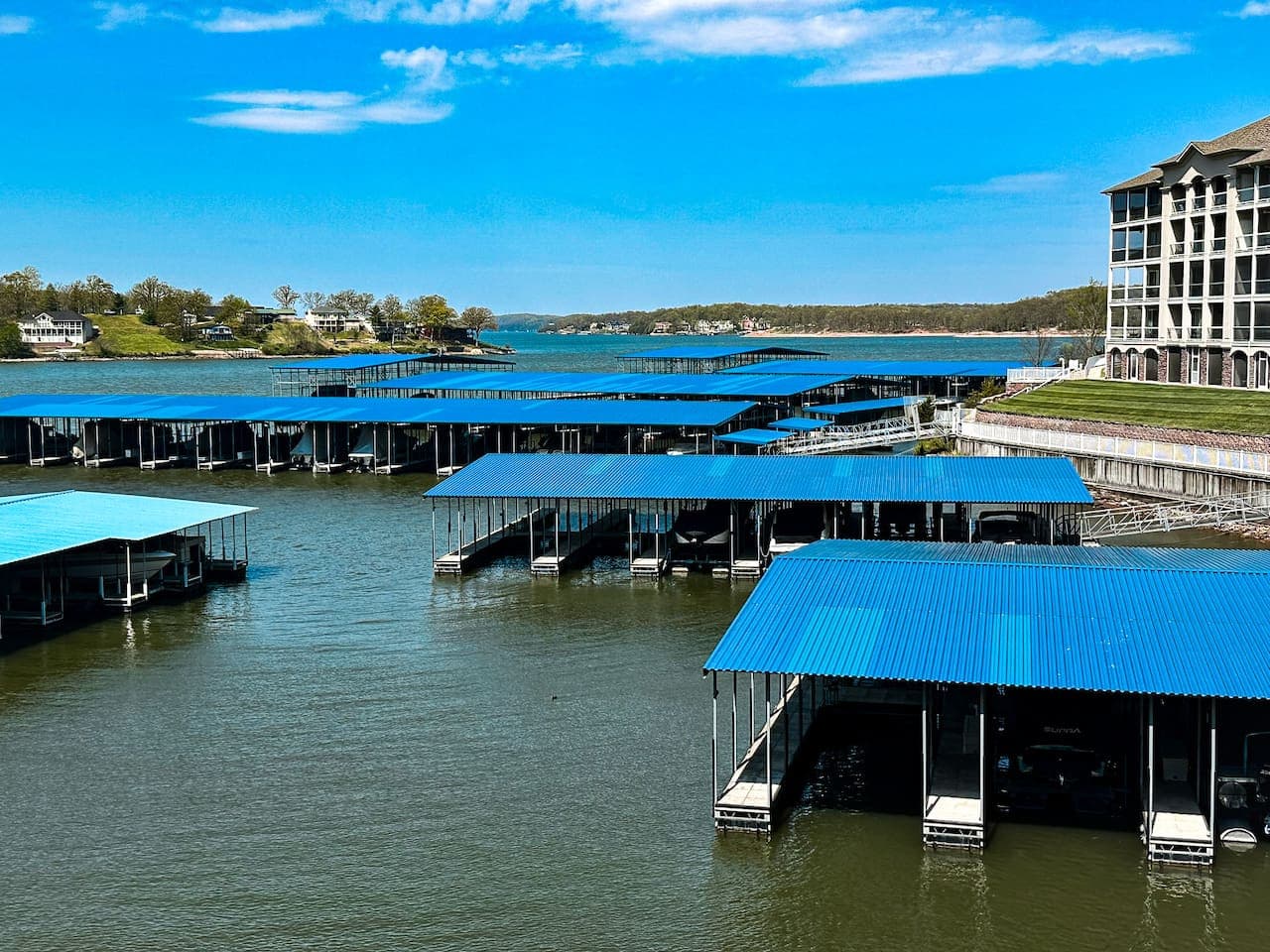 This stunning view from Lookout at Lands End showcases our expansive marina with numerous boat slips, offering convenient access for all your boating and water sport activities.