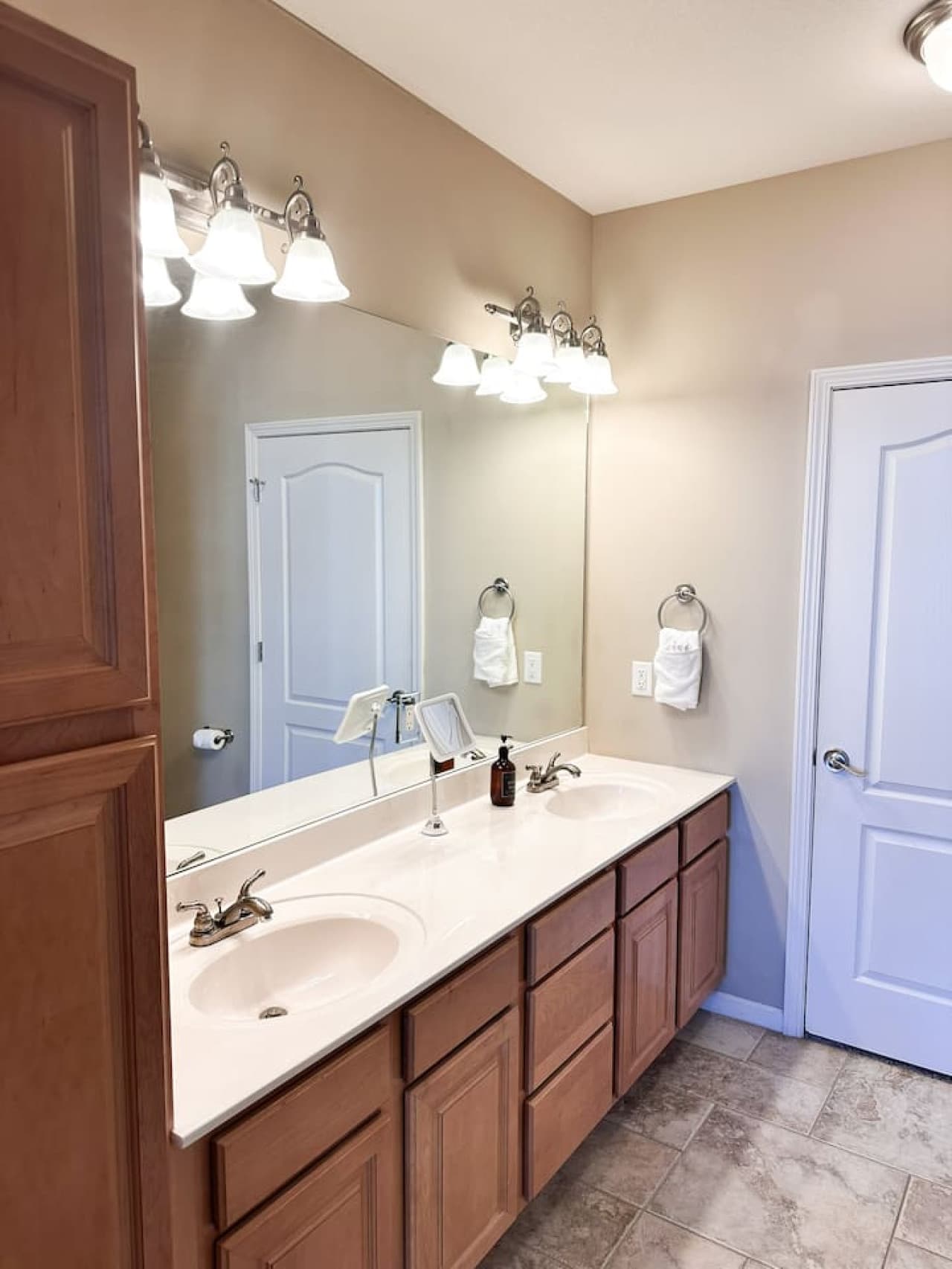 Refresh and rejuvenate in our spacious bathroom at Look Out on Lands End, featuring a convenient double vanity for your comfort.