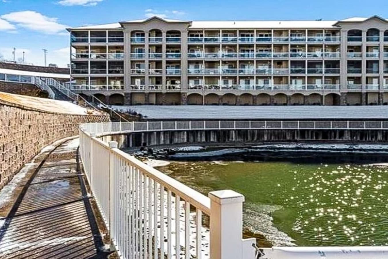 This stunning lakefront condo offers direct access to the water, providing picturesque views and easy boat access from the included private slip. Enjoy breathtaking sunsets and tranquil mornings right from your doorstep in this idyllic waterside retr