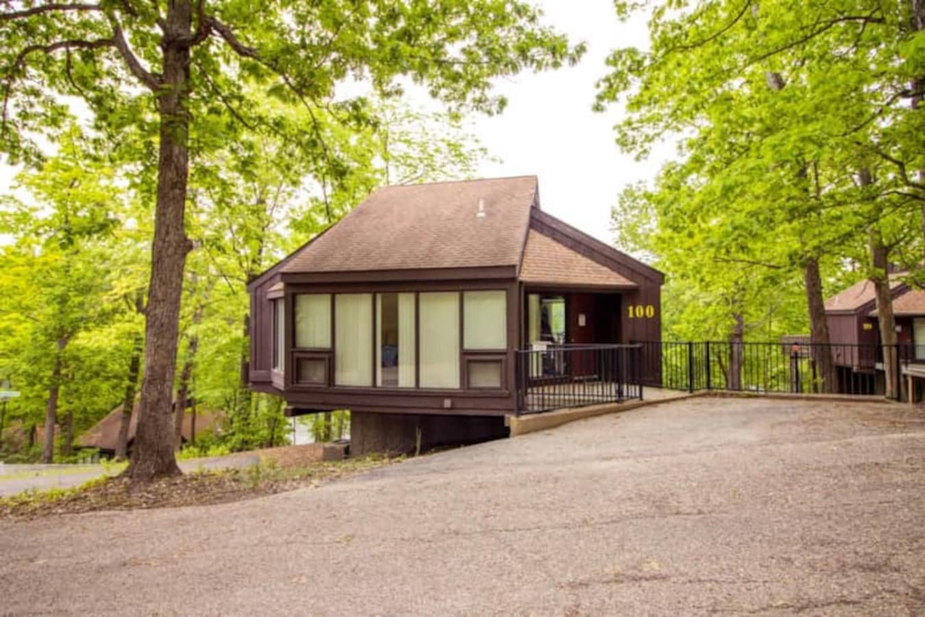 "Discover your perfect getaway at Treeloft Villa 100, blending seamlessly with the natural landscape of Treetop Village."